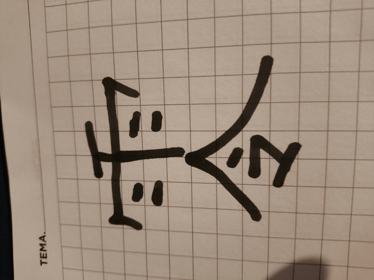 Symbolic cross drawing created on graph paper in La Paz