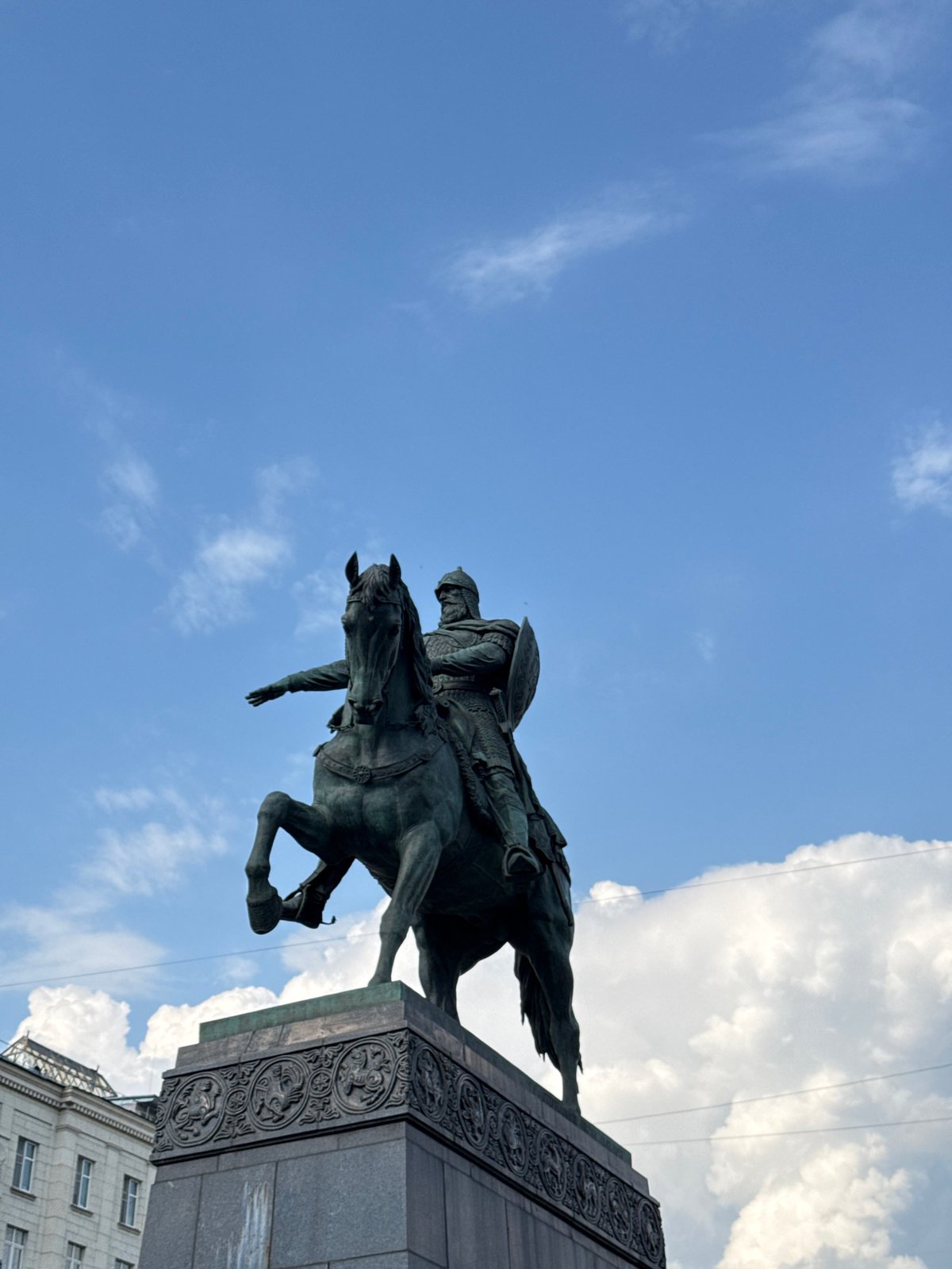 Casual afternoon documentation near ornate table and statue in Moscow