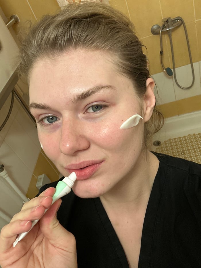 Healthcare worker documents evening skincare routine in Kazan