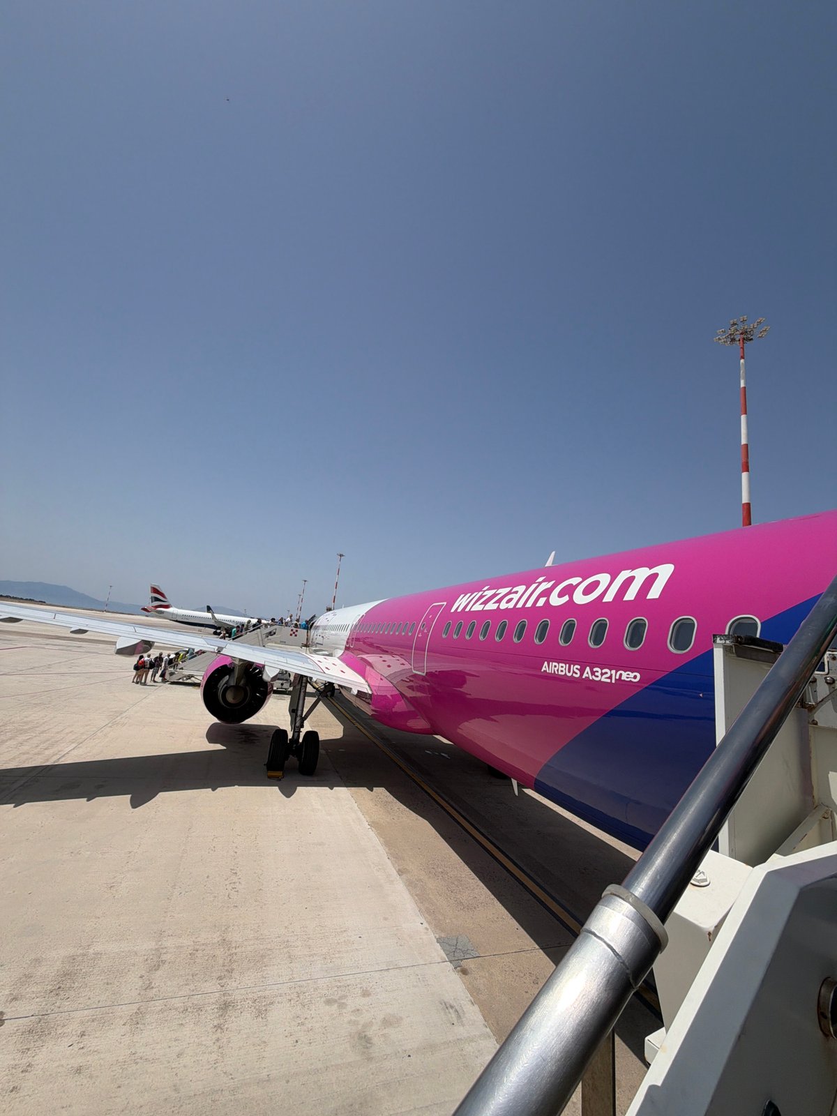 Morning hustle at Palermo Airport, inside and out