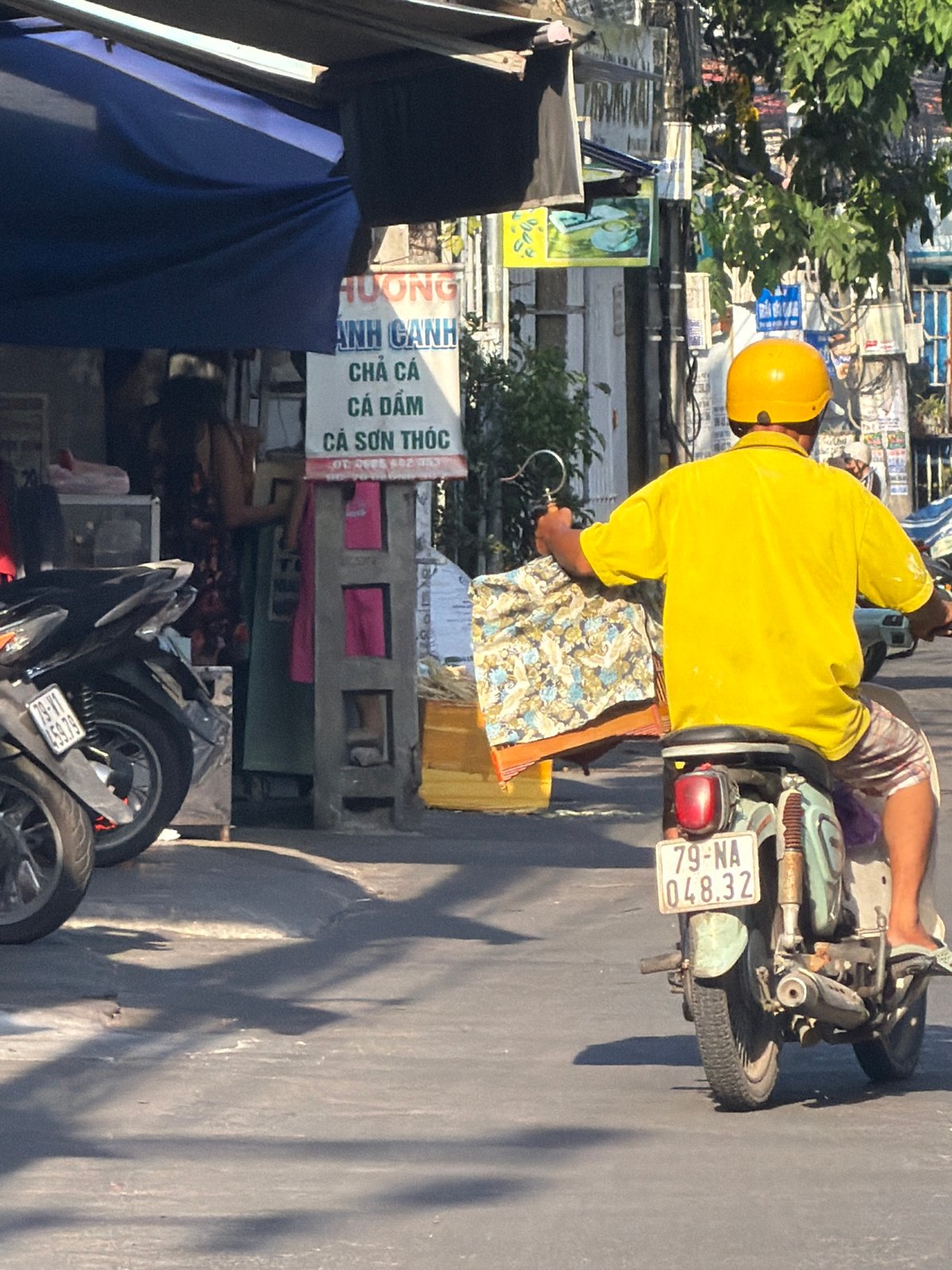 Morning street life across a Nha Trang neighborhood
