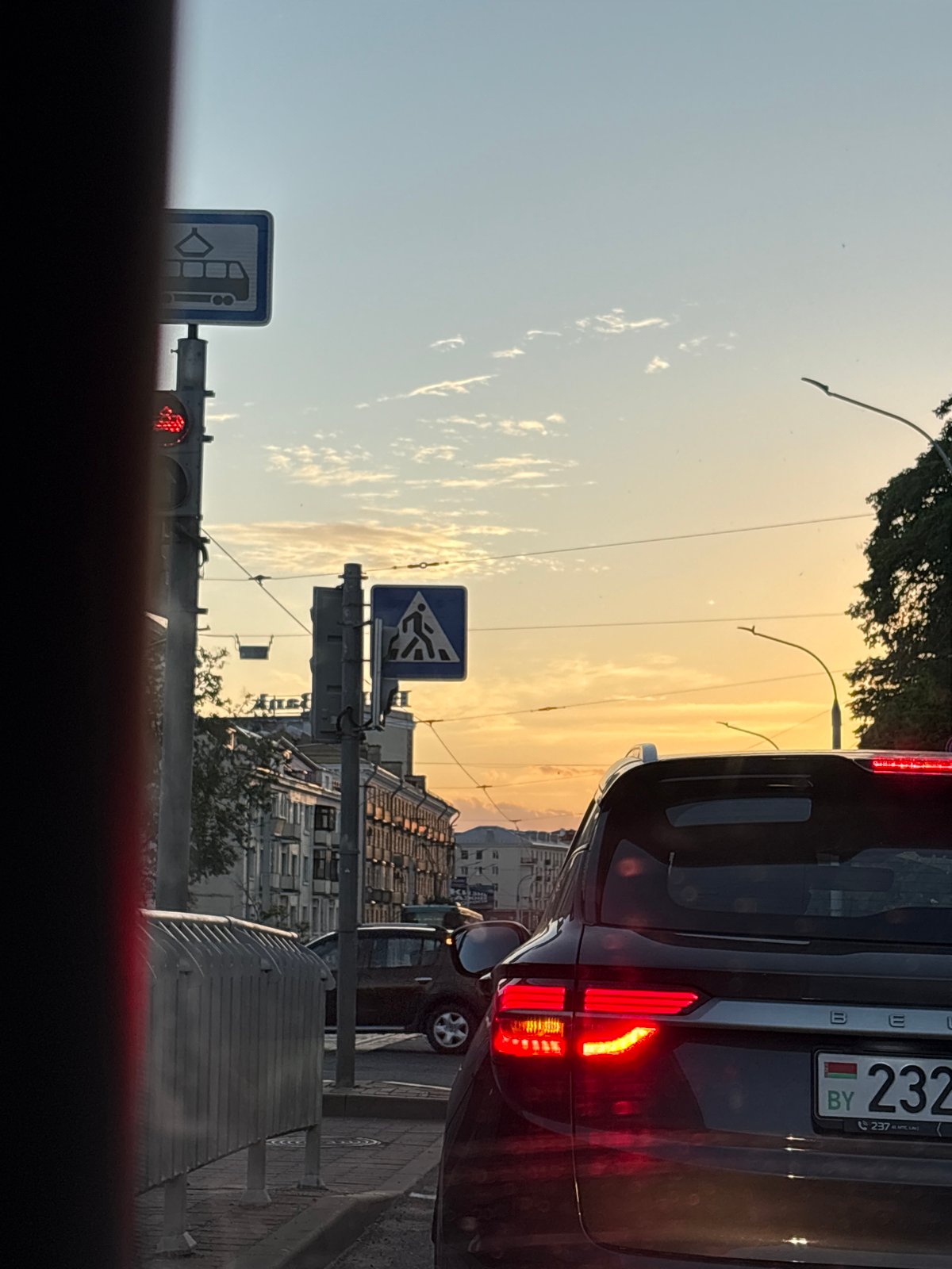 Evening rush hour traffic documented at Minsk intersection