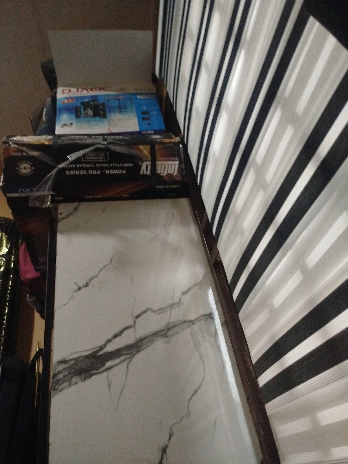Interior details and everyday objects inside a room in Ogbomosho