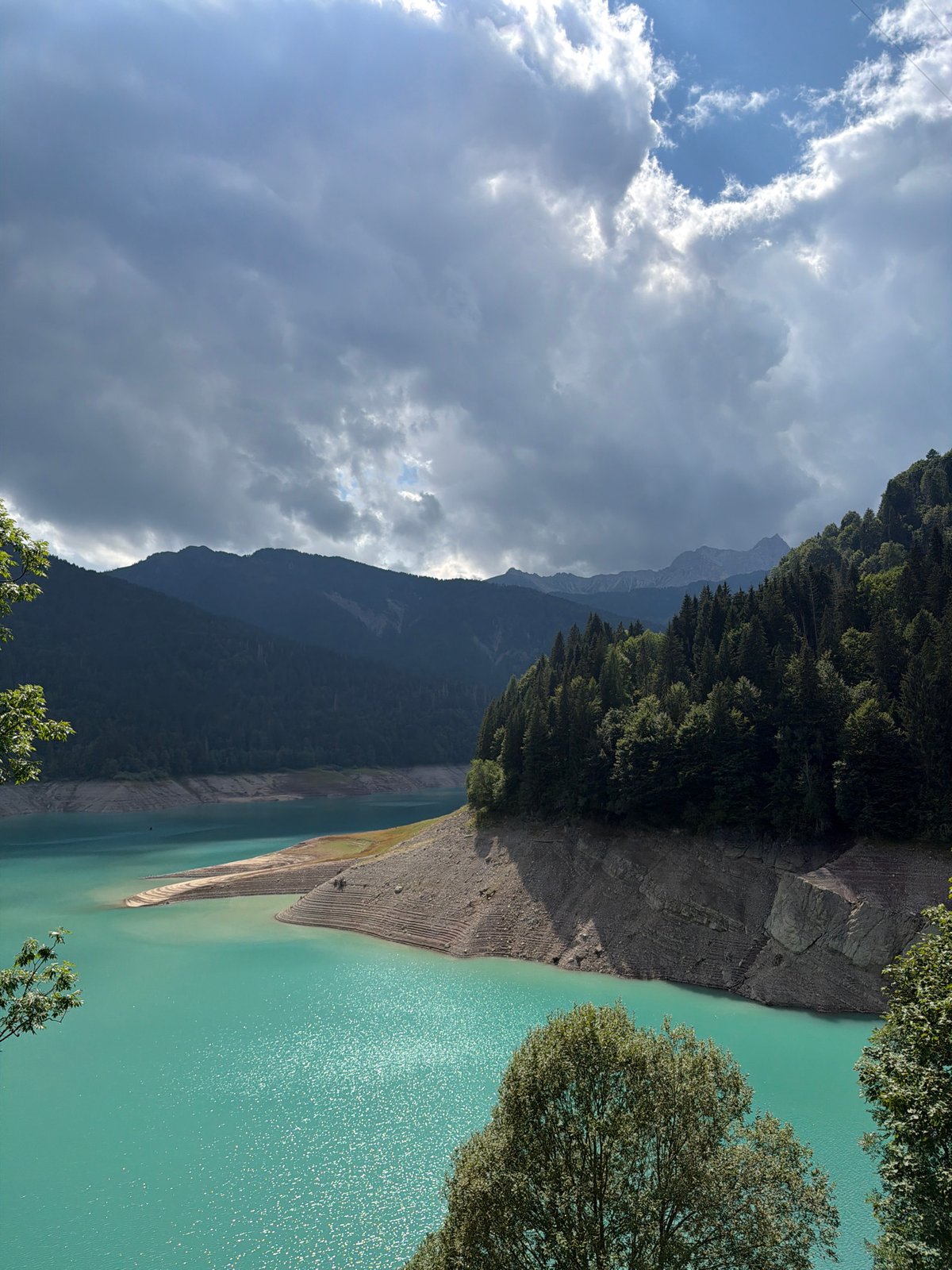 Turquoise alpine lake in Lateis seen from multiple angles