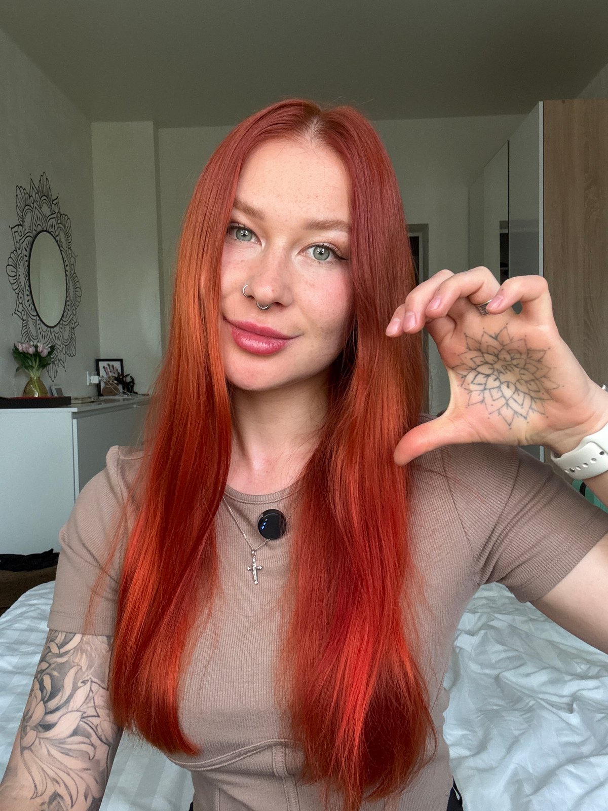 Woman takes selfies in bedroom in Rostov-on-Don