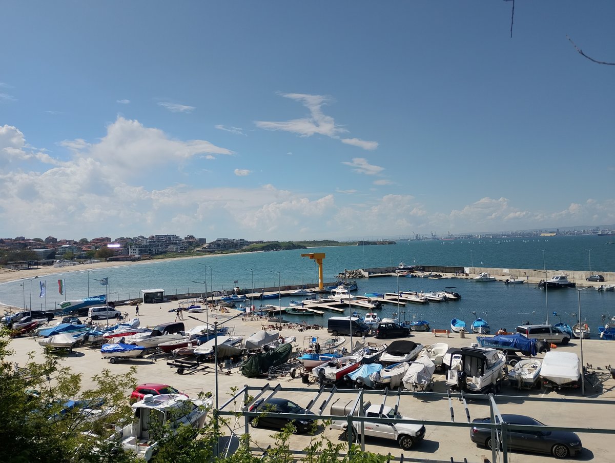 Sunny day documented at Burgas marina with boats and clear skies