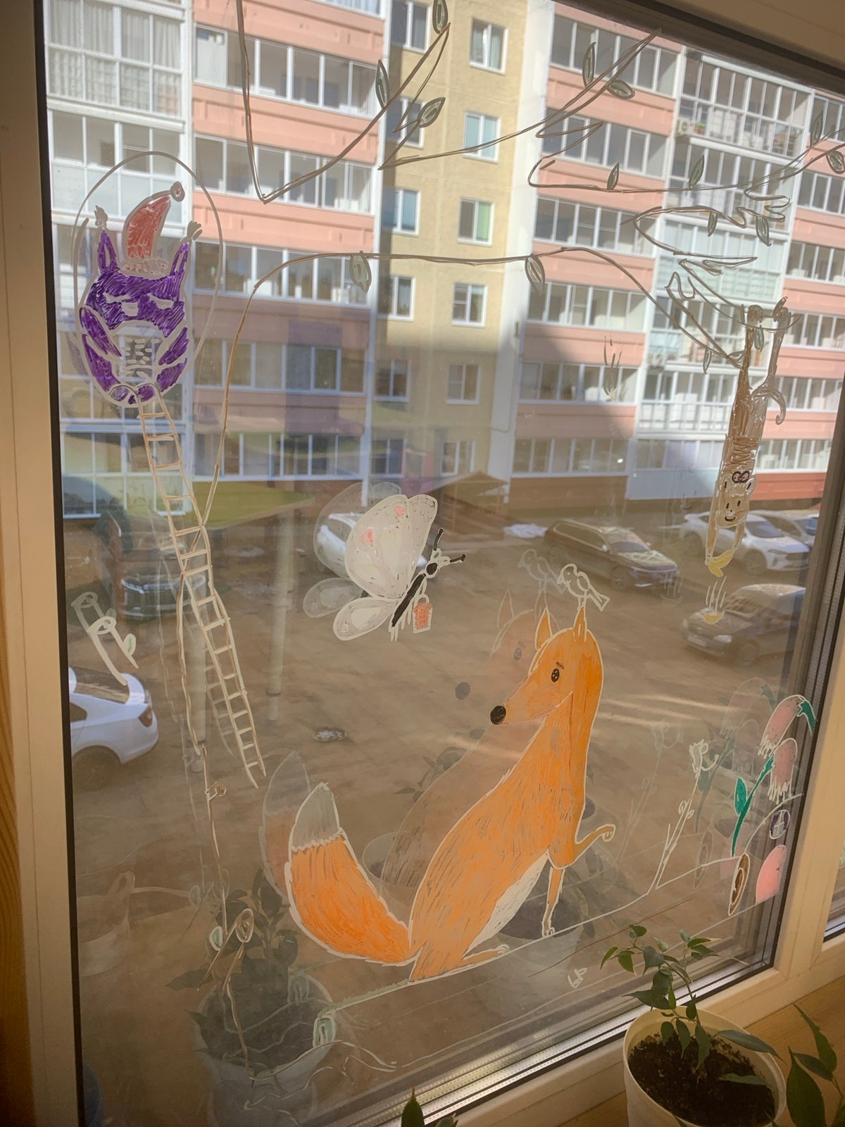 Children's window art brightens Izhevsk apartment views