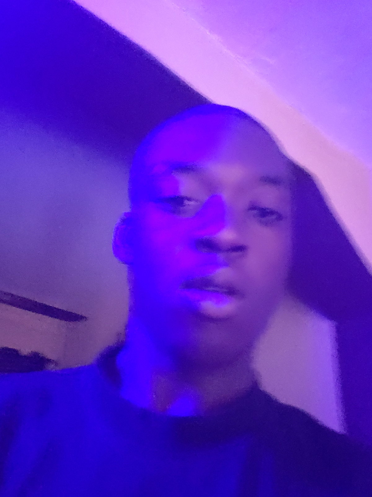 Person illuminated by blue-purple light observed in Nigeria