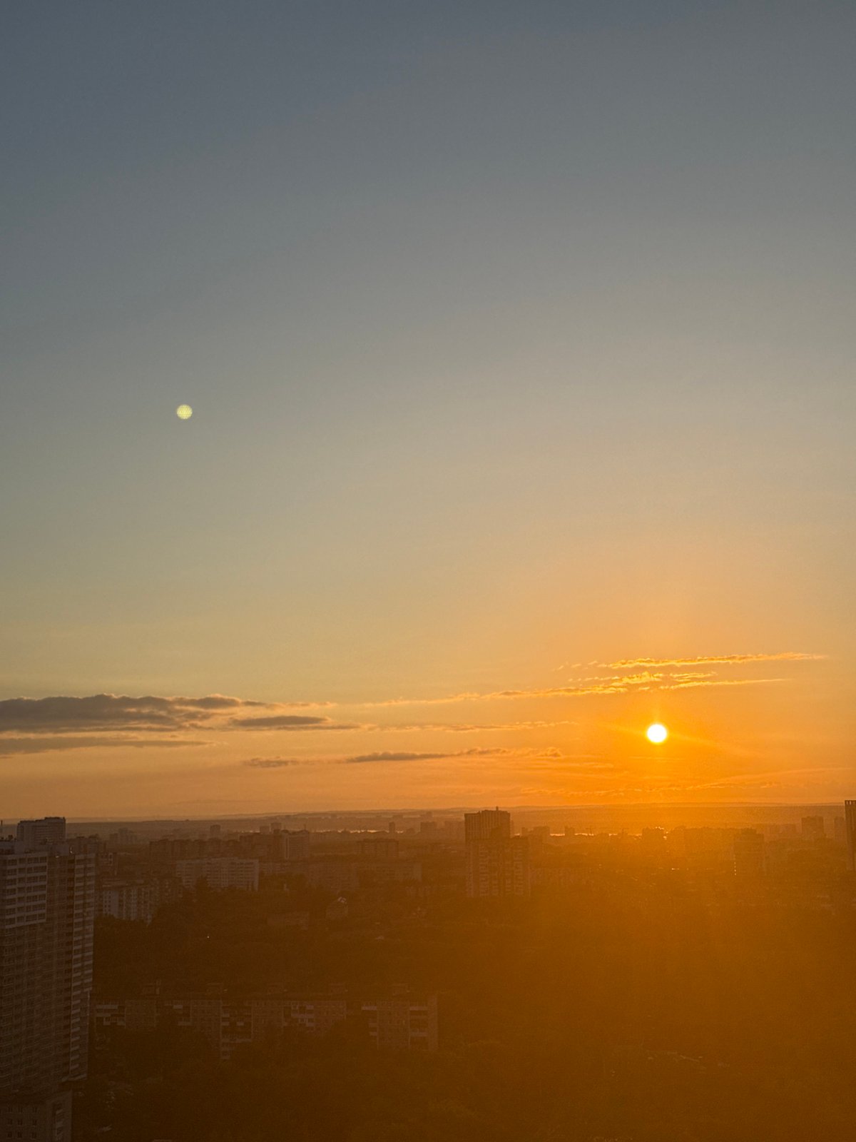 Sunset panorama captured over Perm skyline during golden hour