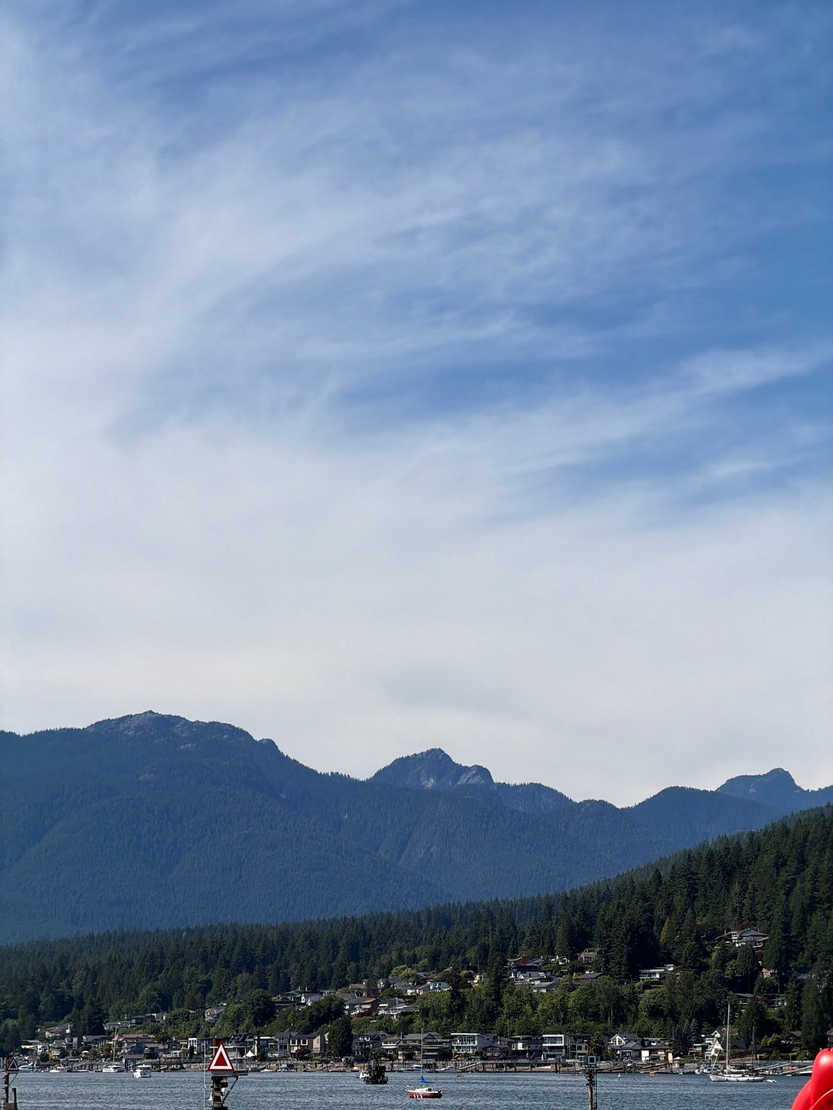 Evening harbor scenes and water activities in Port Moody