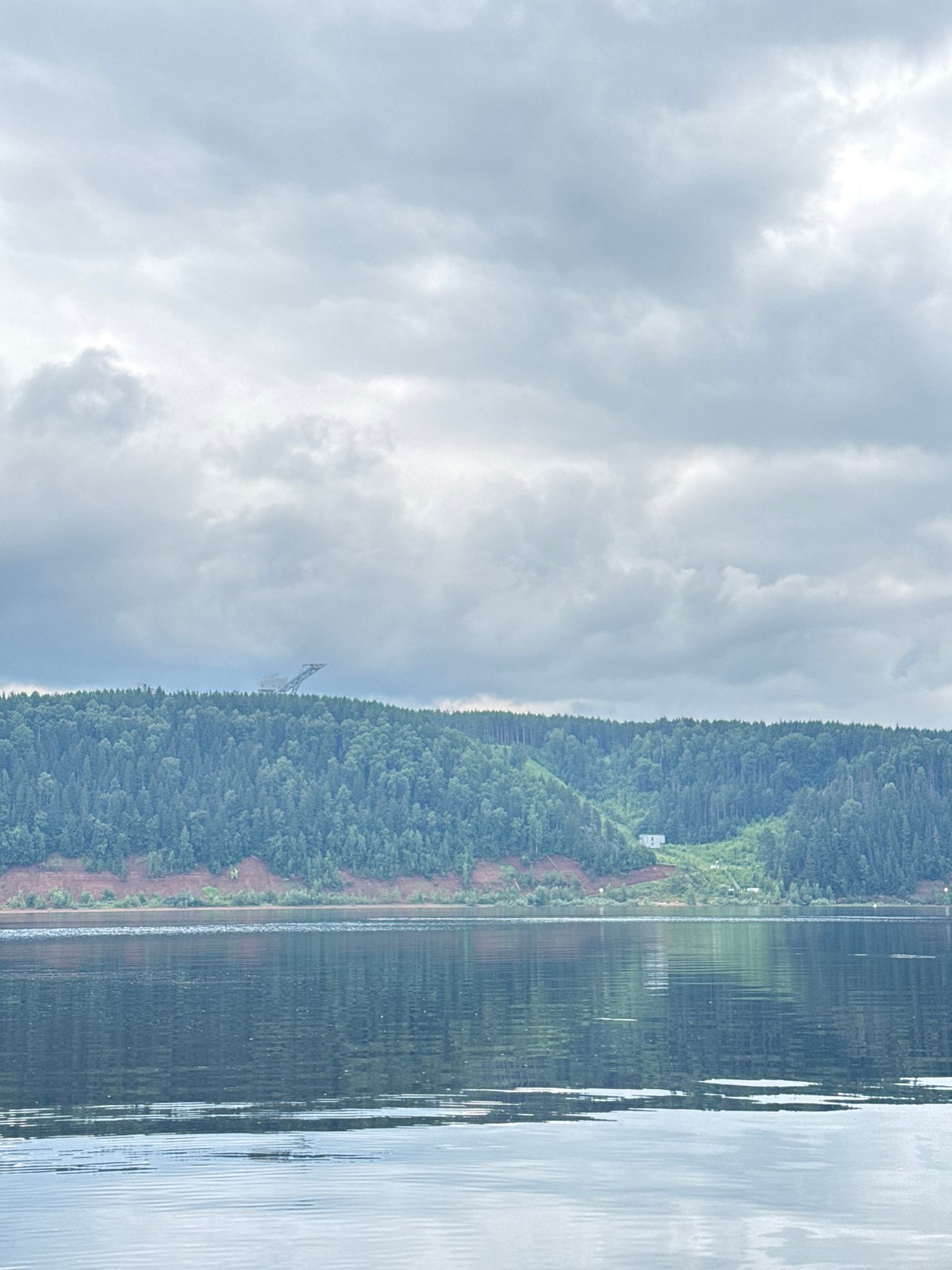 Overcast morning on a wide river in Chaikovsky, Russia