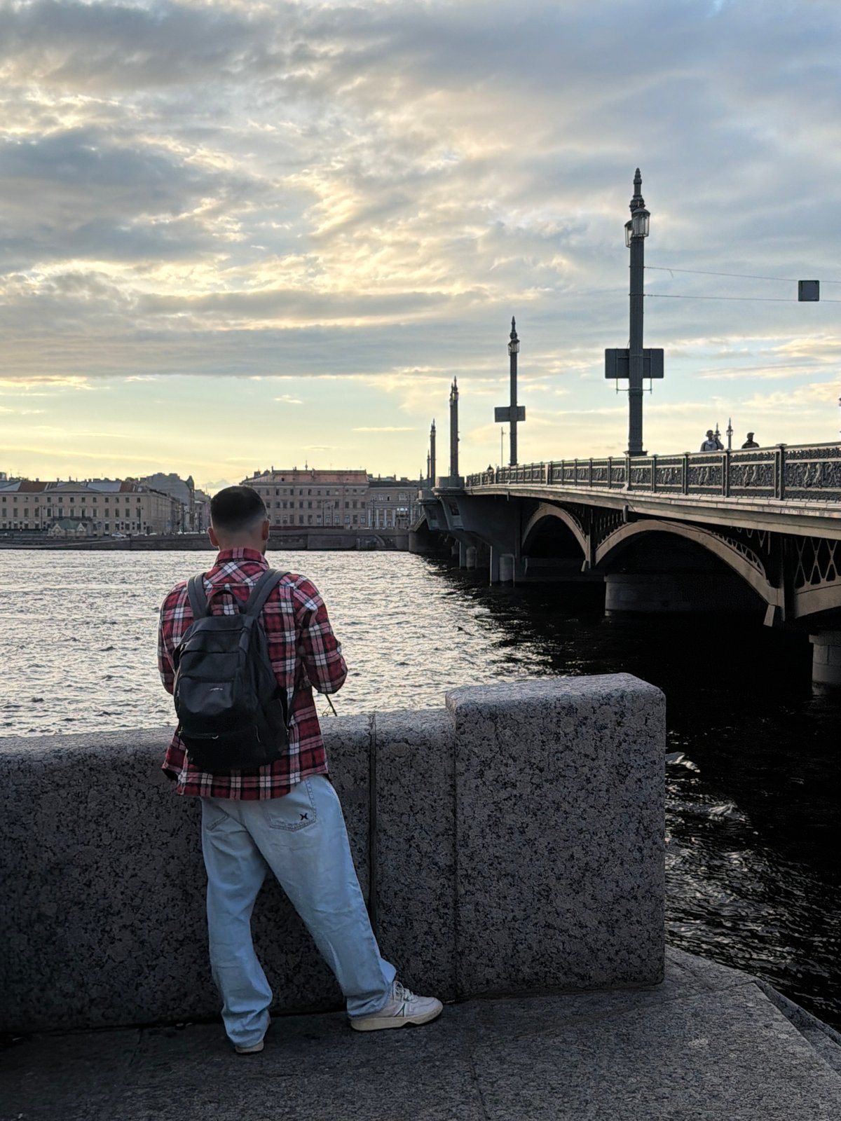 Overlooking the choppy Neva from Saint Petersburg's granite embankment