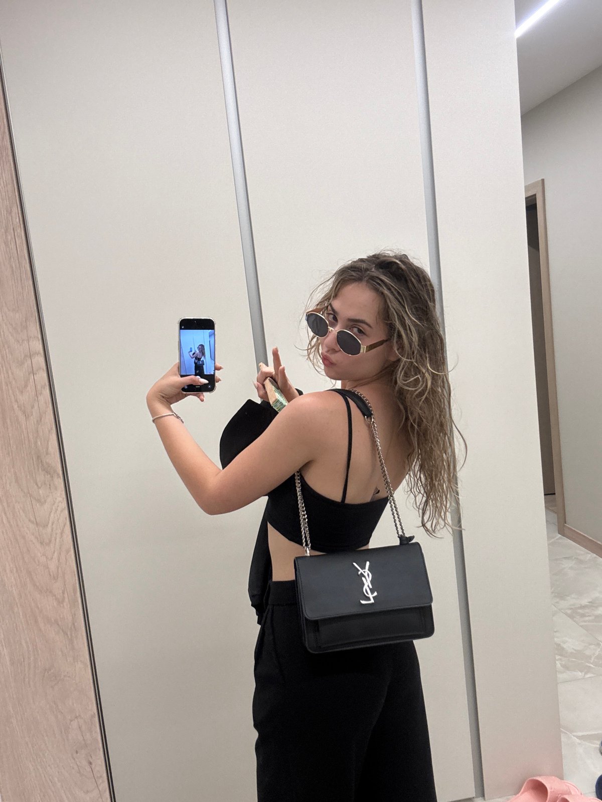 Woman documents selfie session across multiple Sofia locations