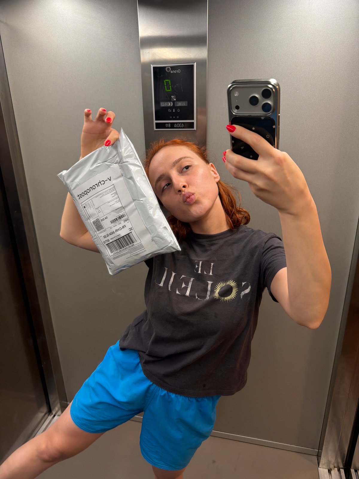 Elevator selfies and a street glimpse in Strasbourg