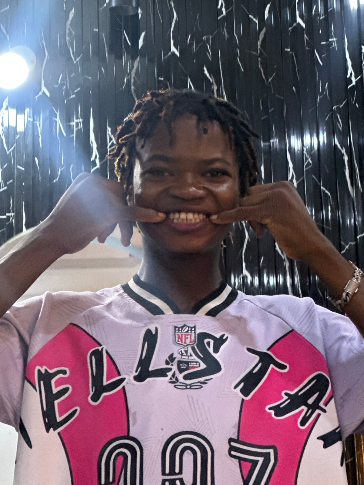 Young men document social moments through selfies in Ogwashi-Uku