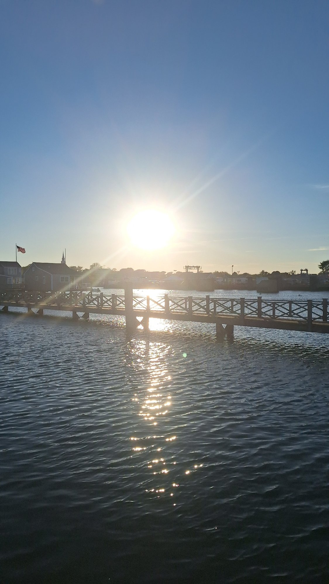 Peaceful evening harbor scene documented across Nantucket waterfront