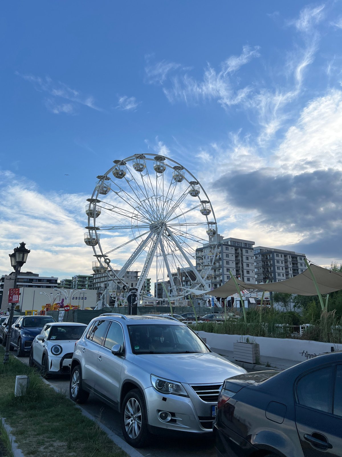 Summer afternoon along Năvodari's Black Sea beachfront and promenade