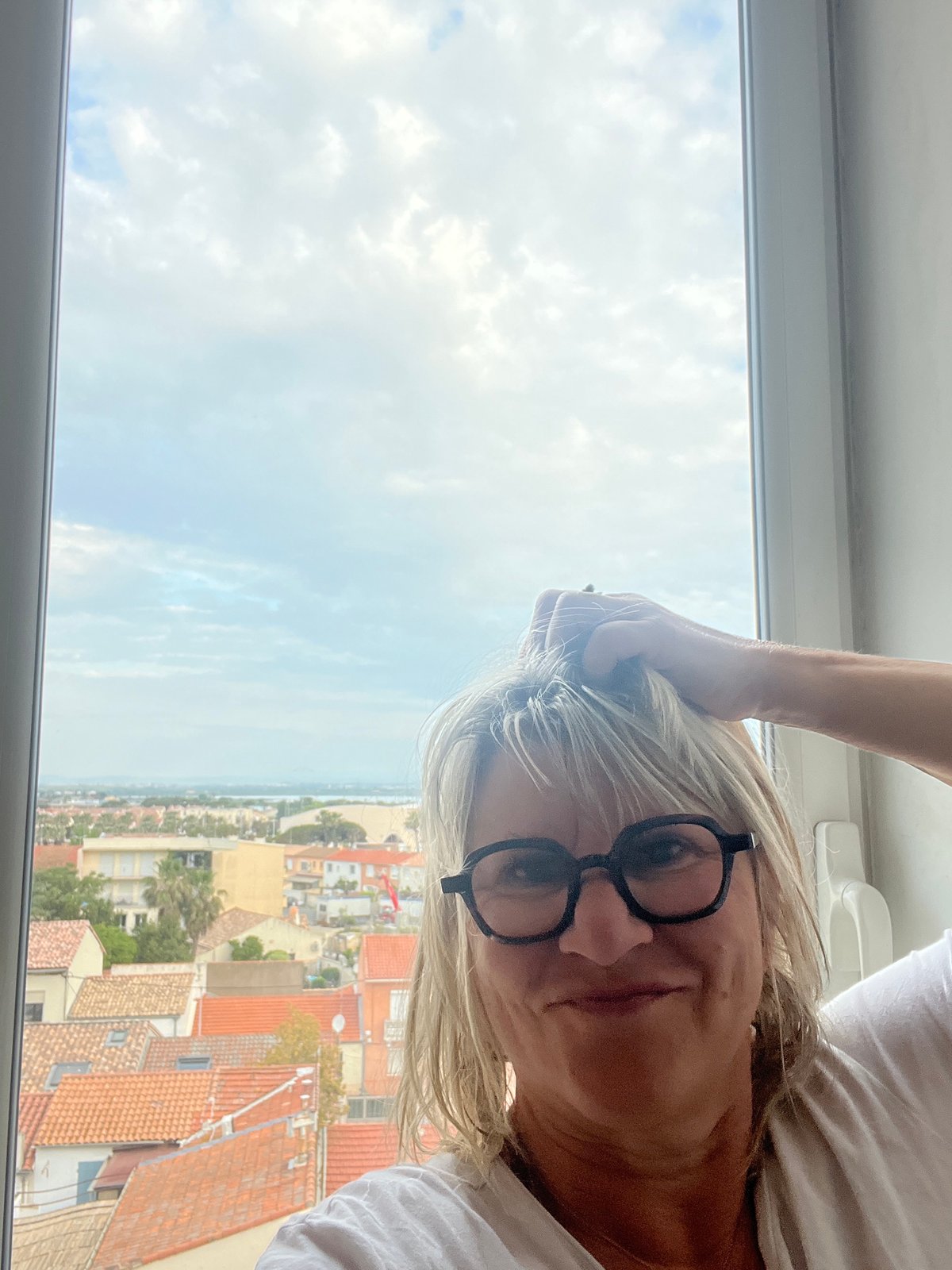 Woman captures dawn aerial views of Palavas-les-Flots from high vantage