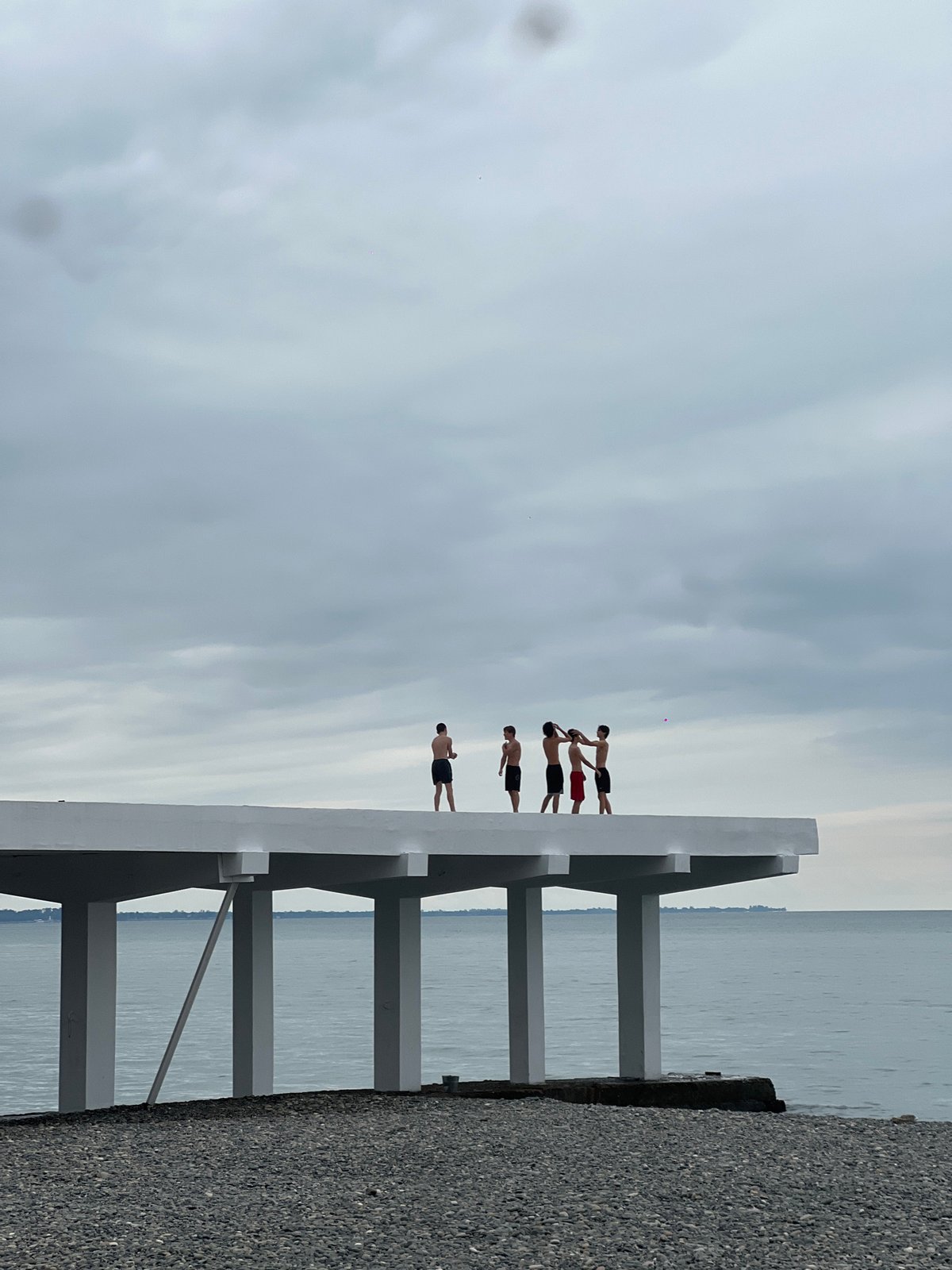 Hanging on a white pier's edge in Sokhumi, Abkhazia