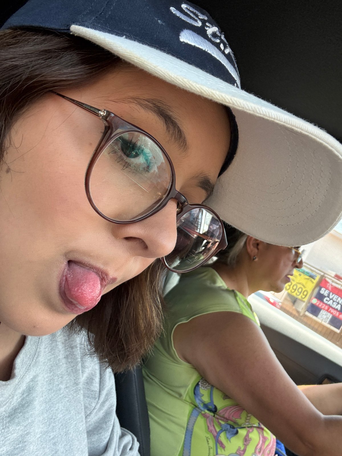 Woman takes car selfie in Puebla, Mexico