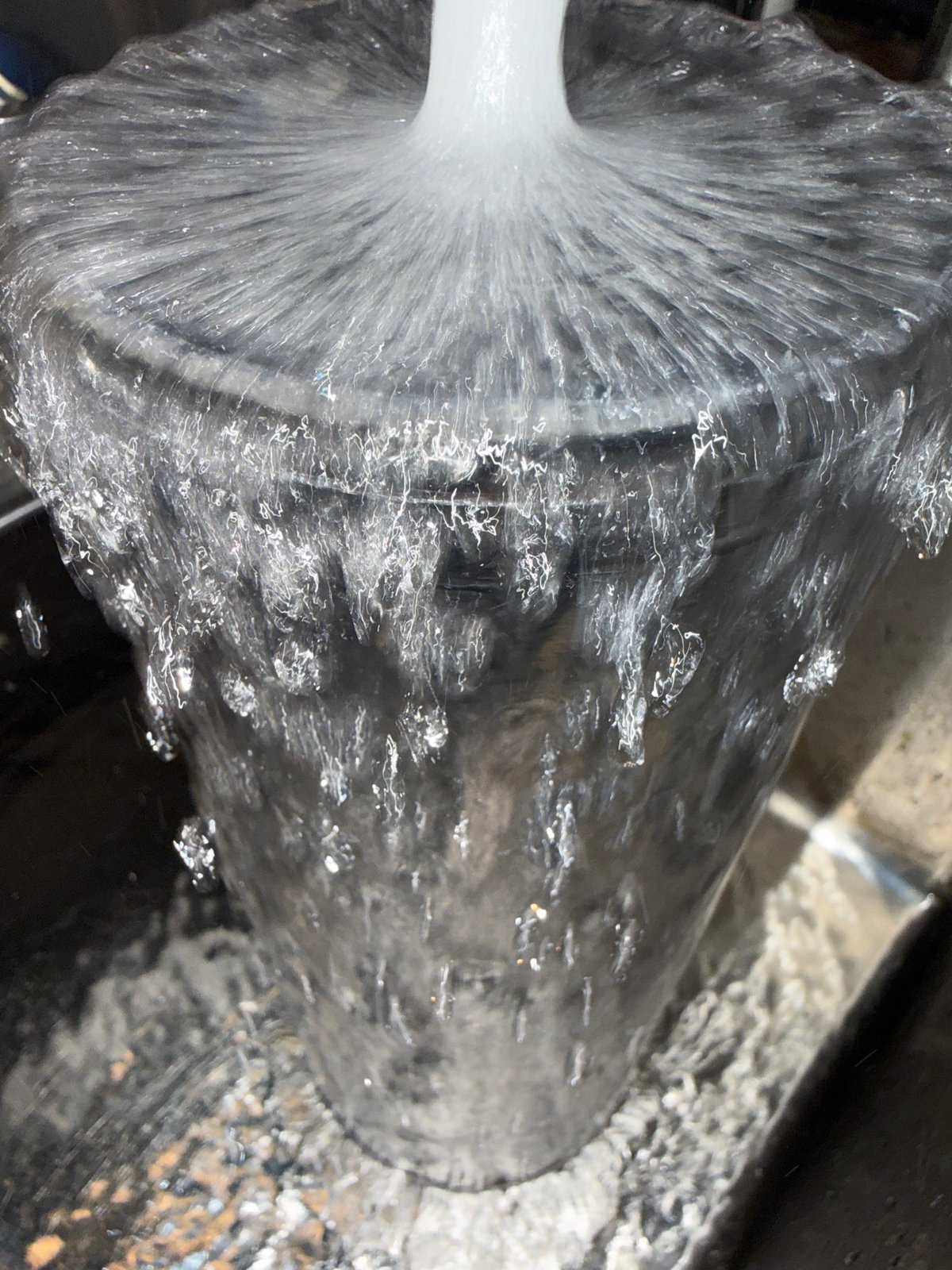 Moscow resident handles water containers in cafe setting