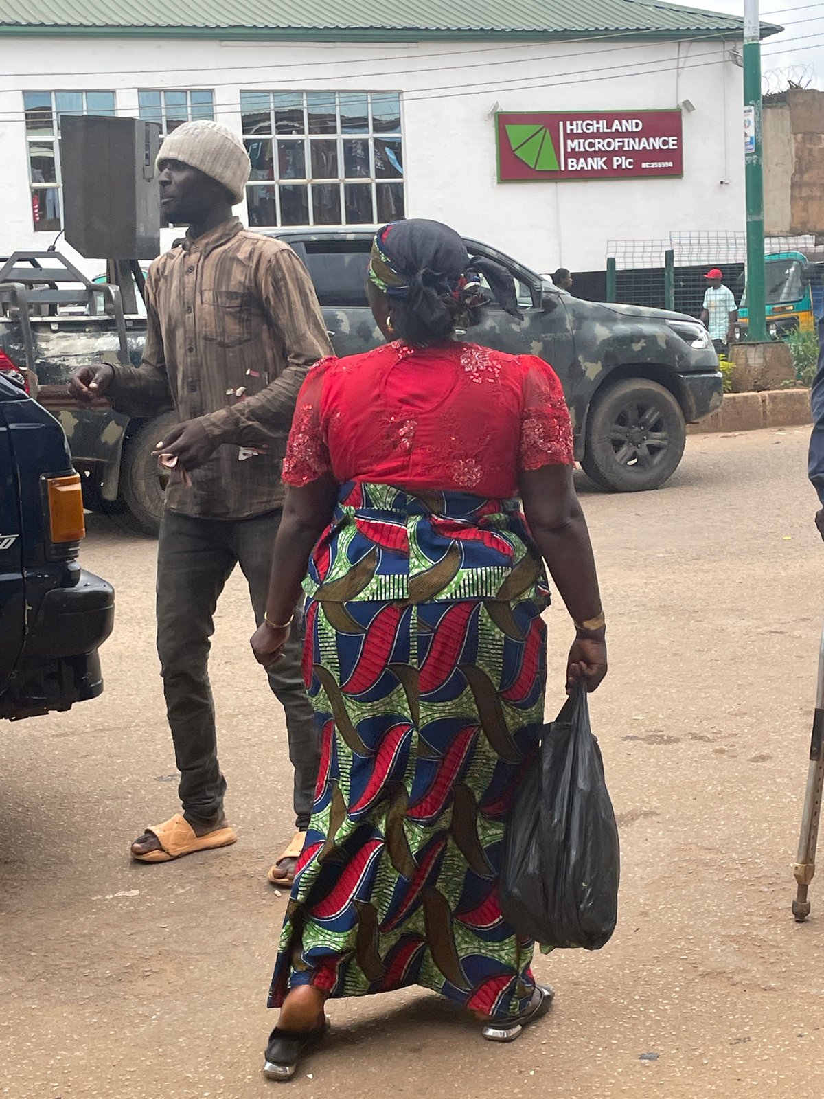 Midday street and market life in Bukuru, Nigeria