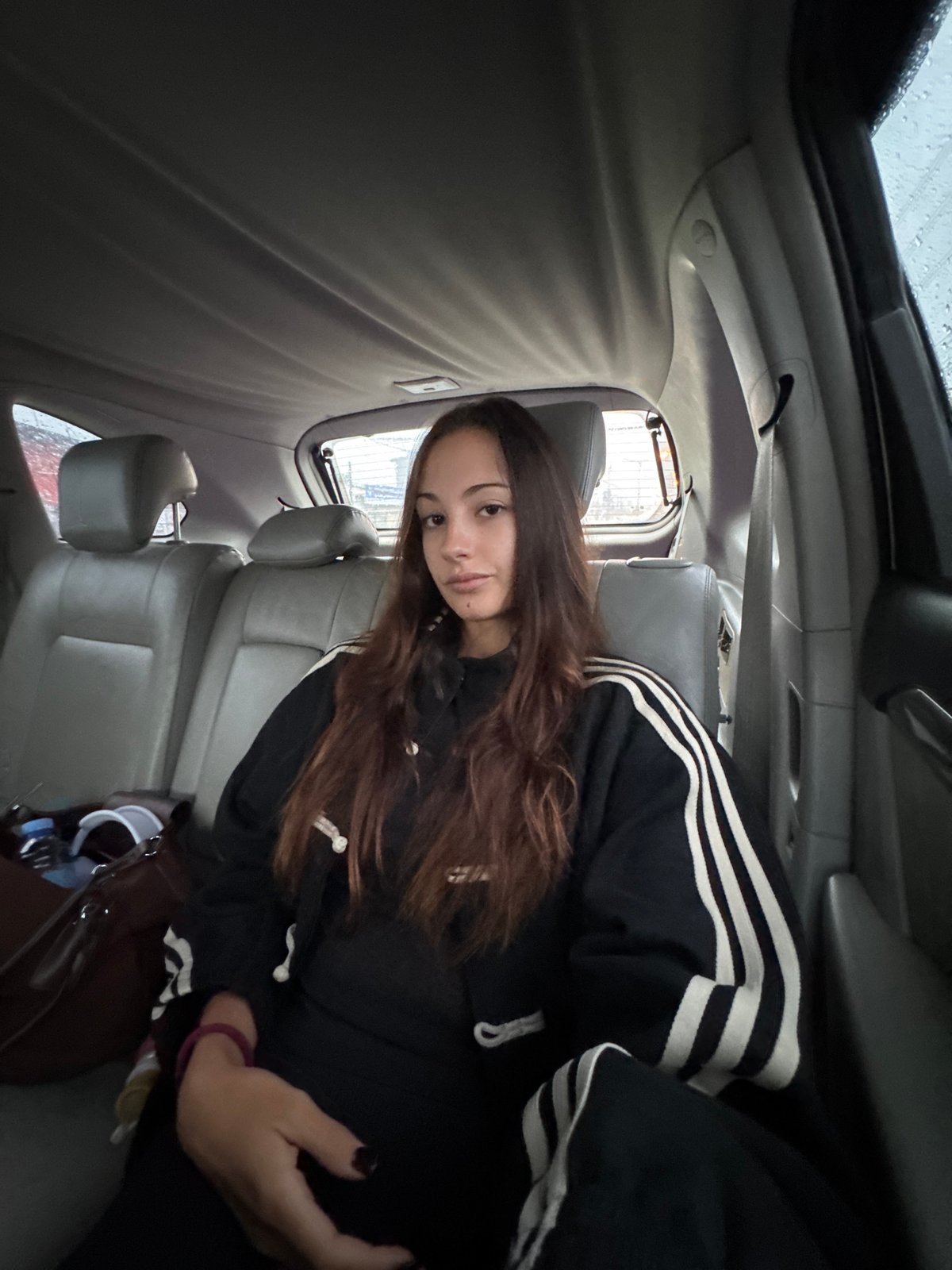 Woman travels as passenger through rainy Si Sunthon night