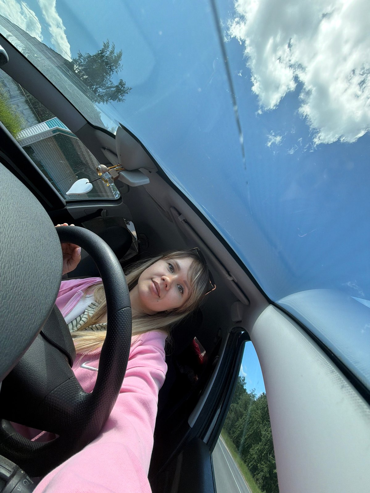 Woman poses for selfies during car stop in Chernushka