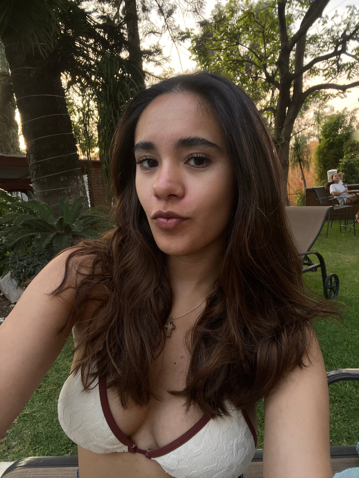 Woman takes poolside selfies in Tenextepec, Mexico