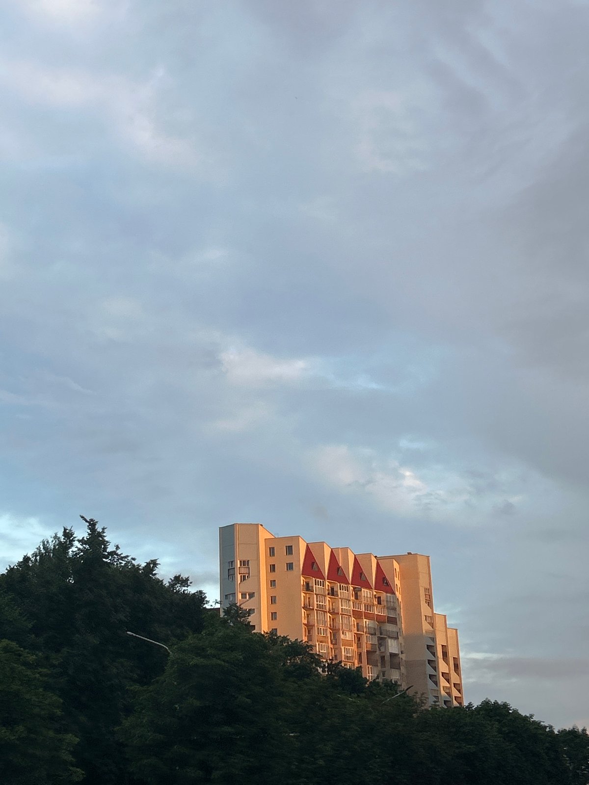 Minsk streets and skyline at golden hour, July 2026