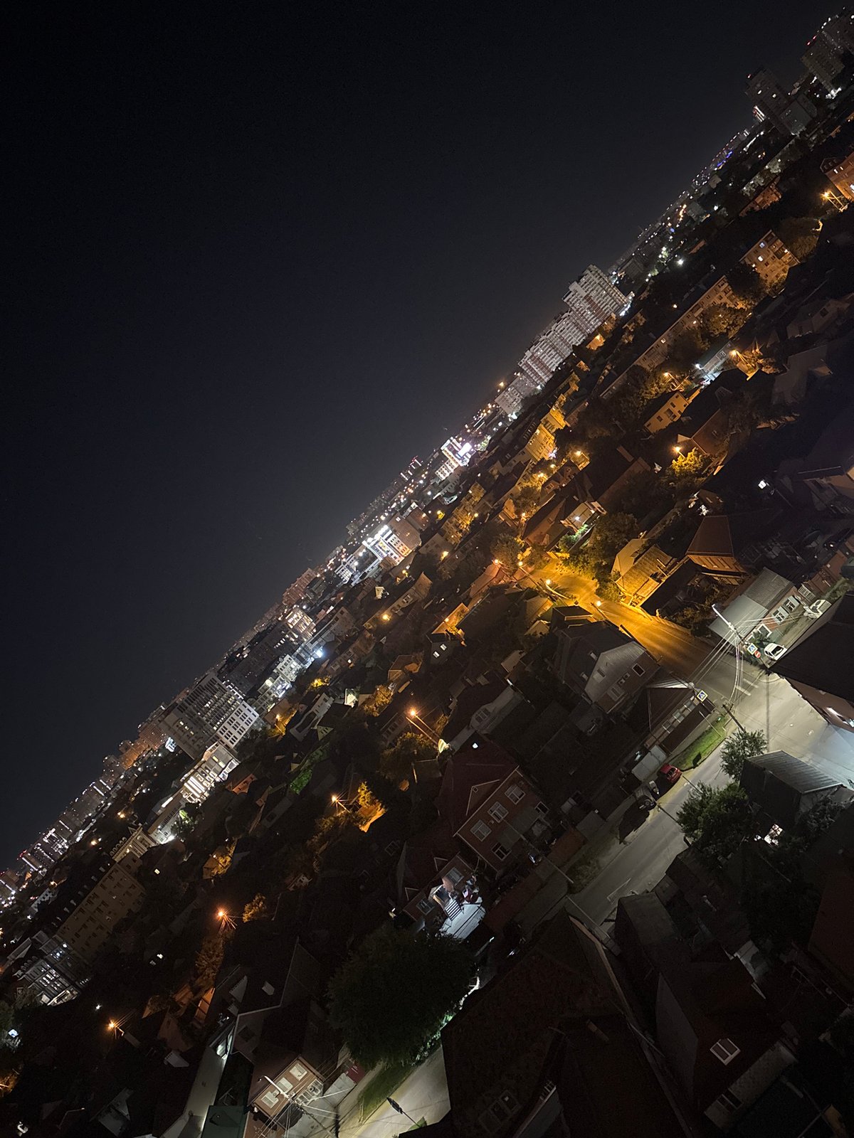 Balcony night out in Krasnodar with a French Bulldog