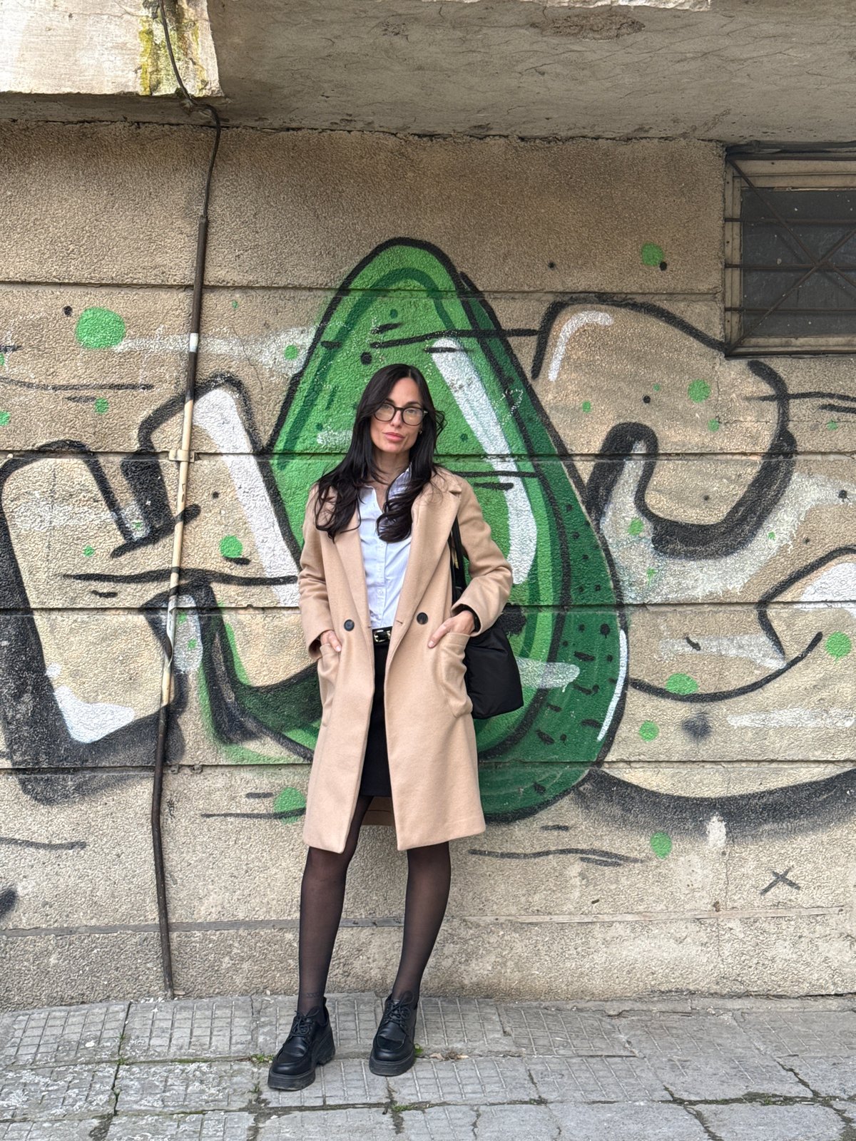 Woman poses for photos around Pleven during afternoon outing