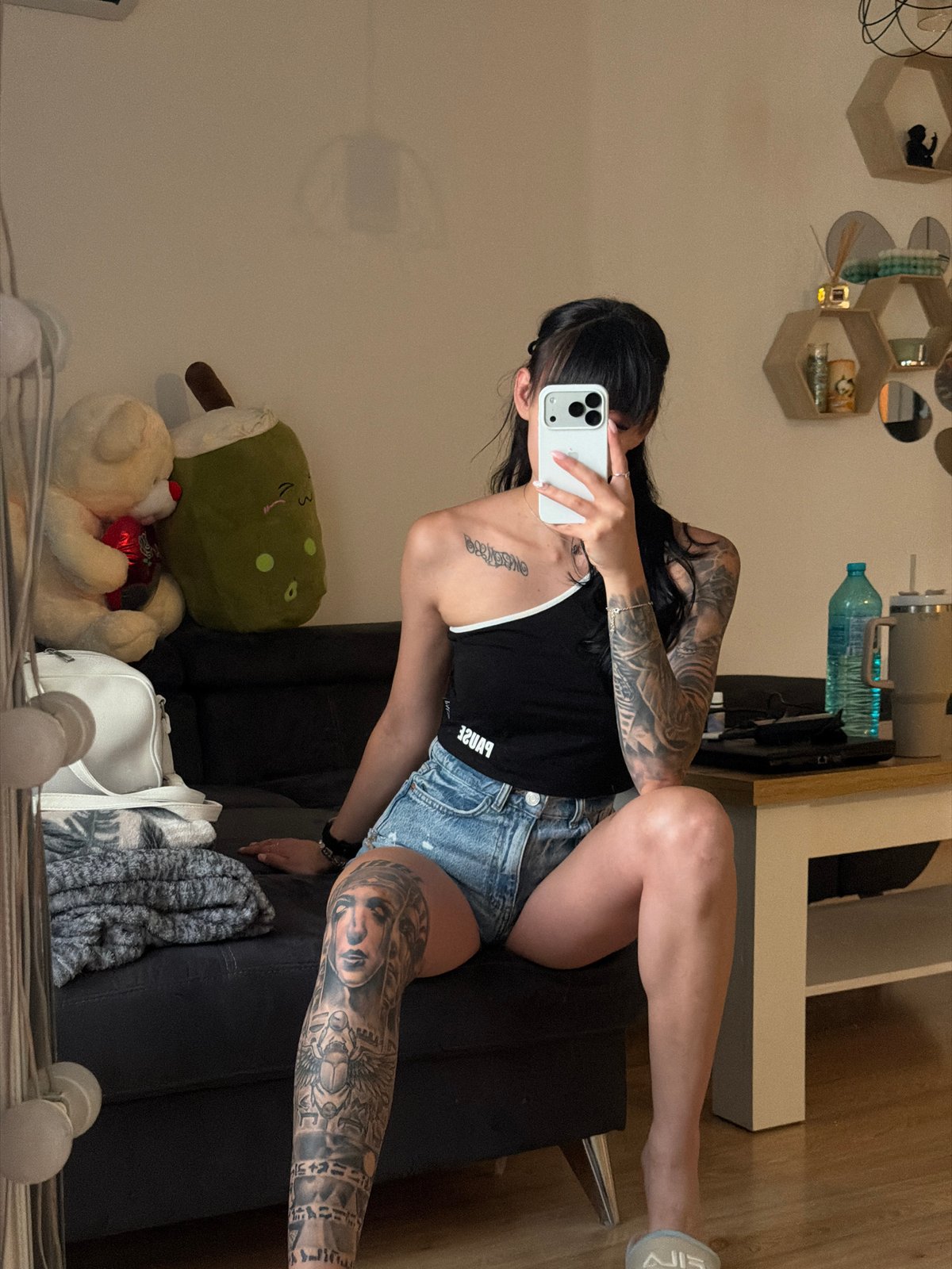 Woman takes mirror selfies in black top in Plovdiv