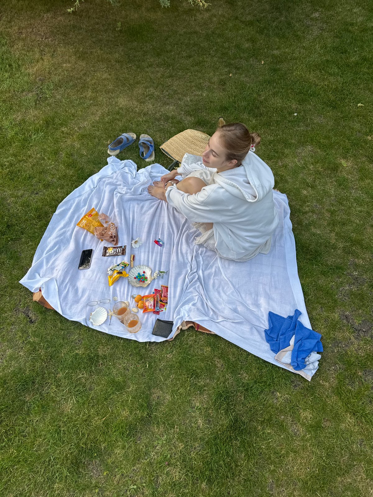 Woman enjoys outdoor moment on blanket in Balaklava district