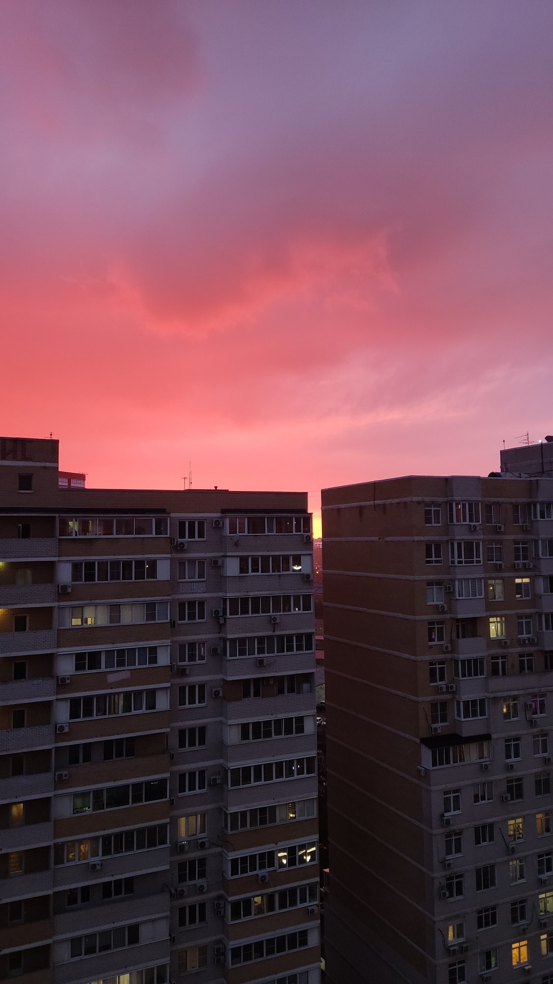 Evening documentation captures Krasnodar apartment blocks and indoor scenes