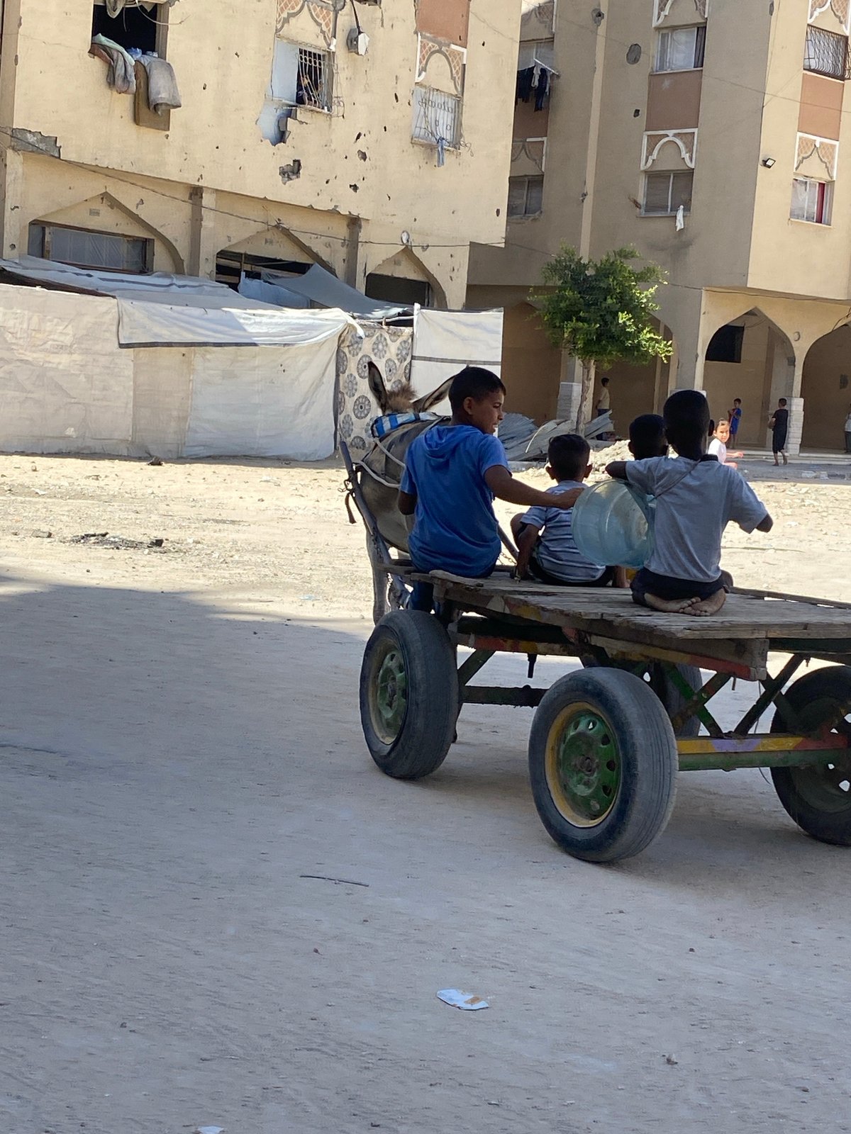 Construction machinery operations documented in Khan Yunis debris zones