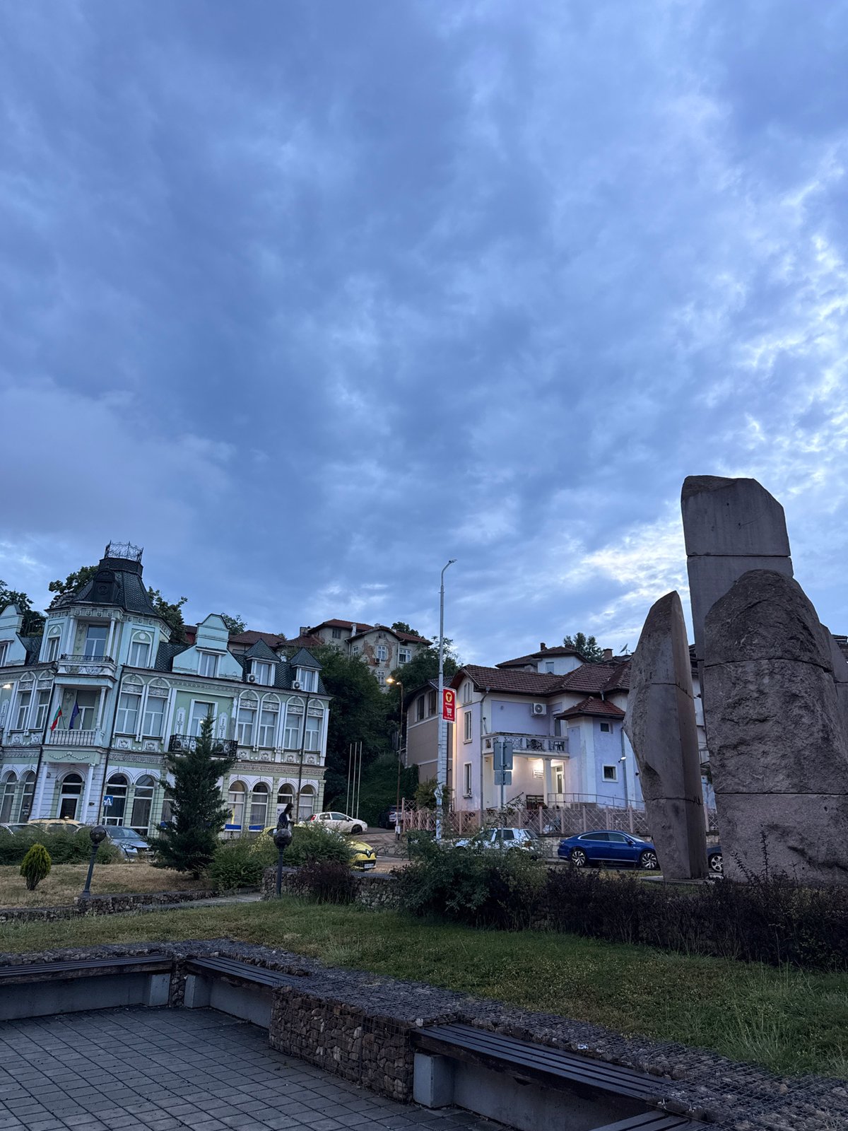 Lovech street corner, gabion walls and white building at dusk