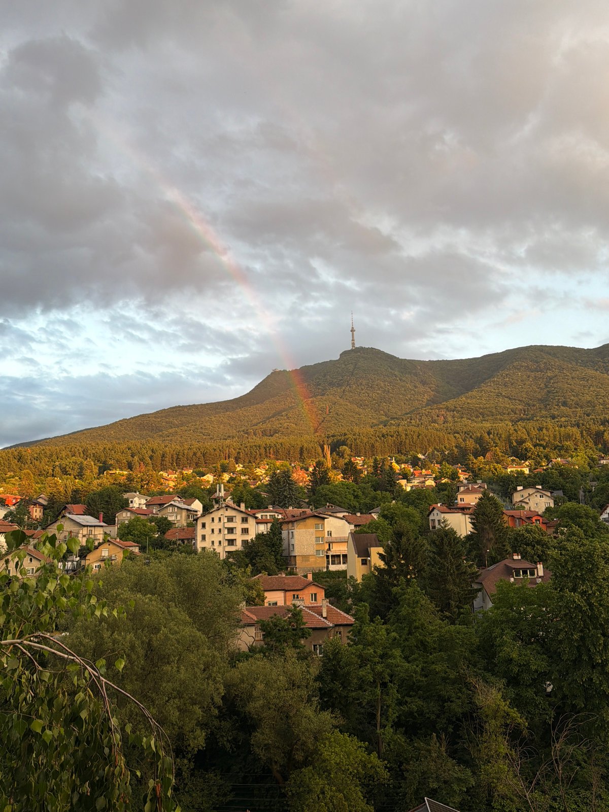 Sofia hillside views with Vitosha backdrop and a rainbow