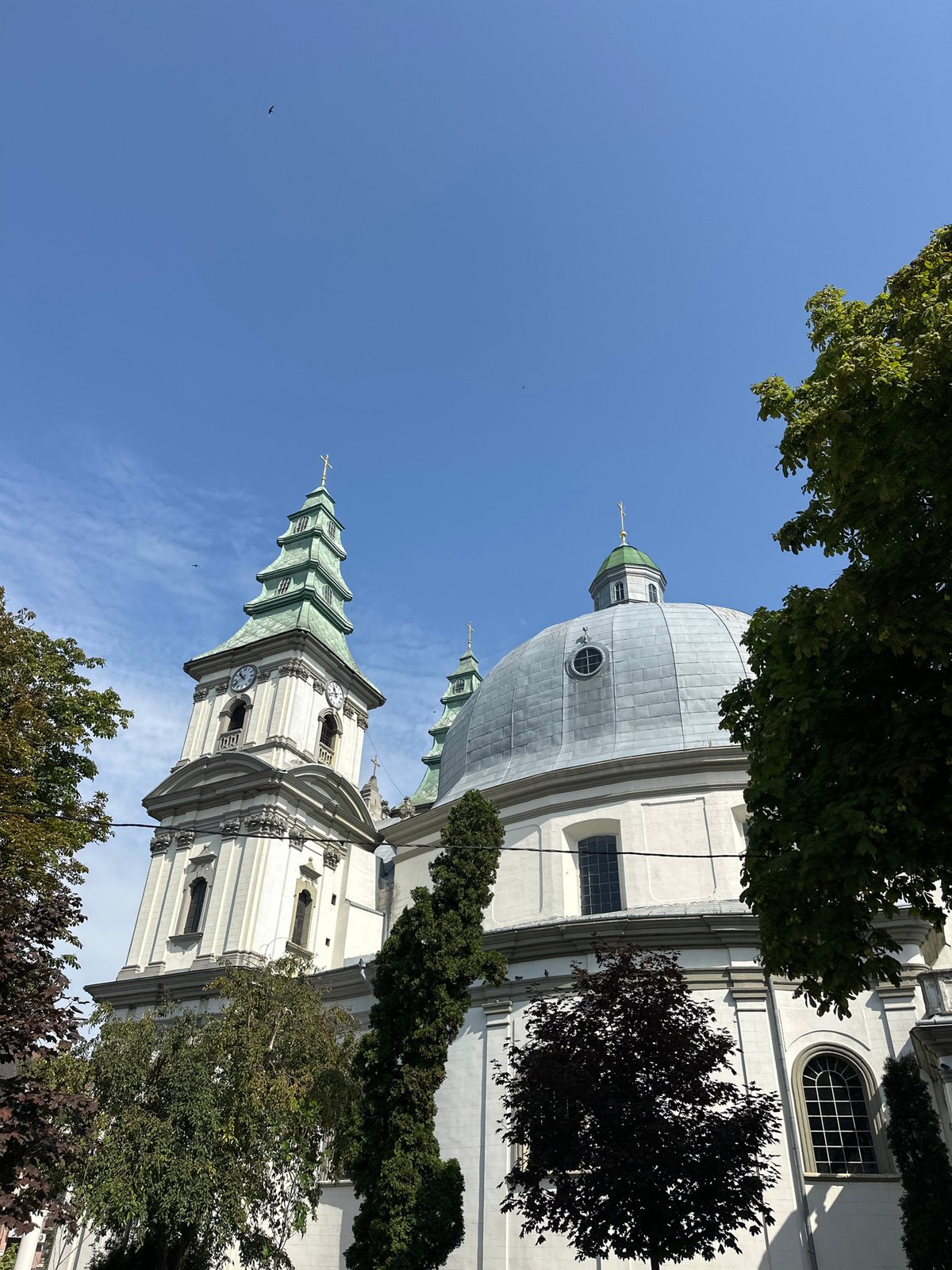 Summer morning scenes around Ternopil's cathedral and pedestrian streets