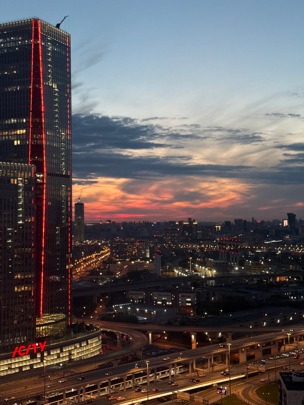 Dusk settles over Khimki, from skyline aerials to street scenes
