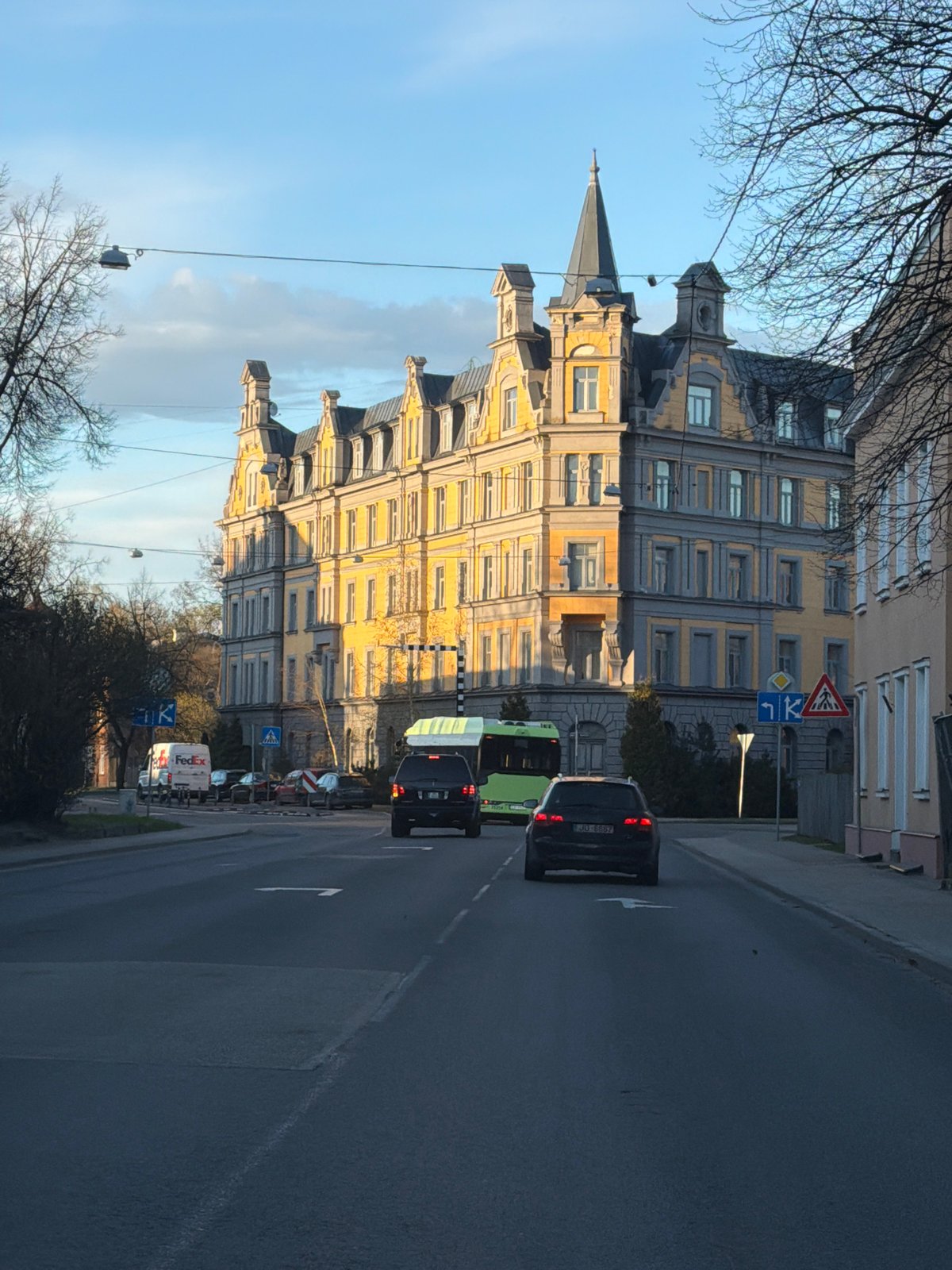 Riga afternoon captured: street scenes and dog companion moments