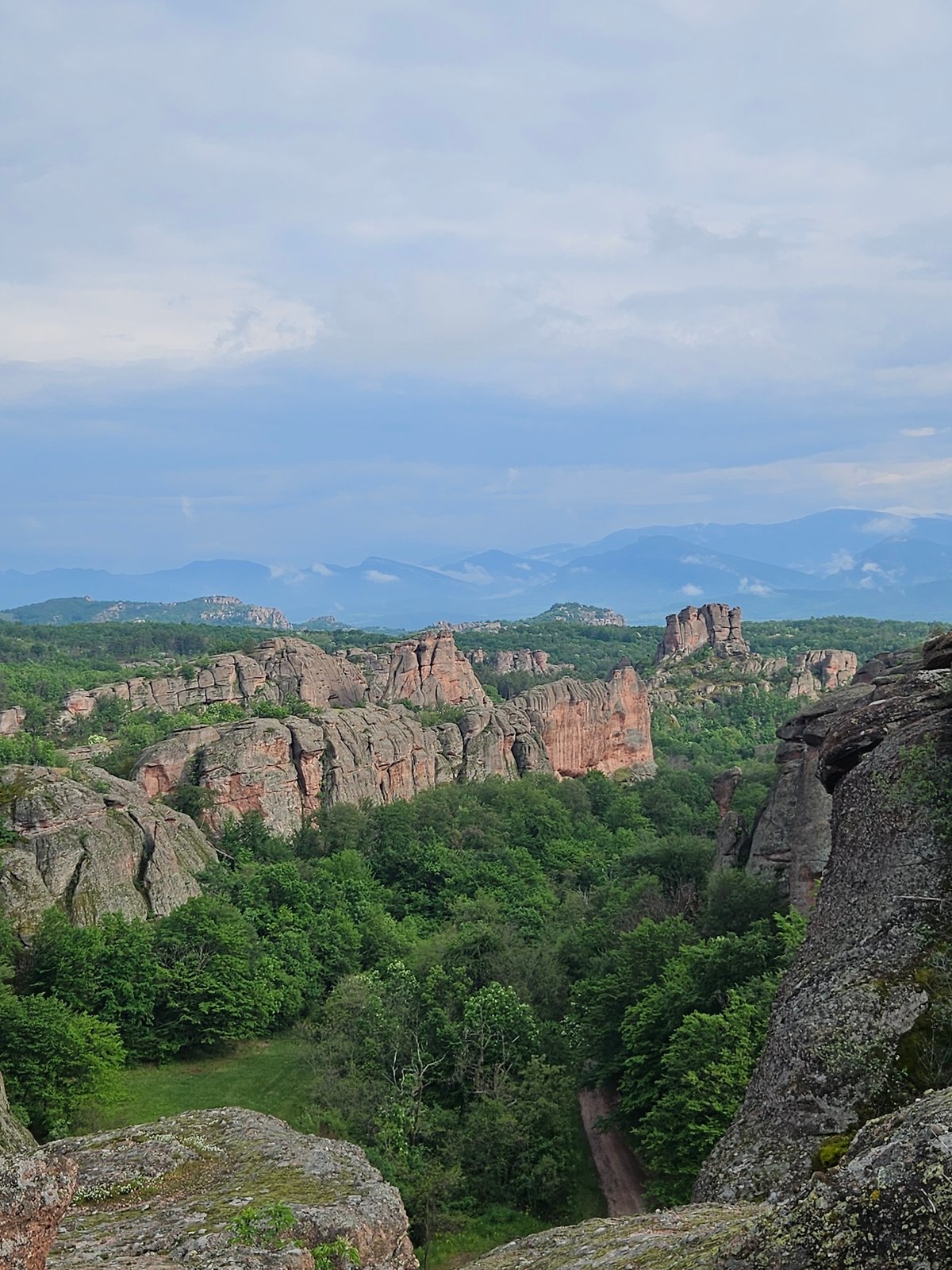 Tourist photographs Belogradchik Rocks geological formation in Bulgaria
