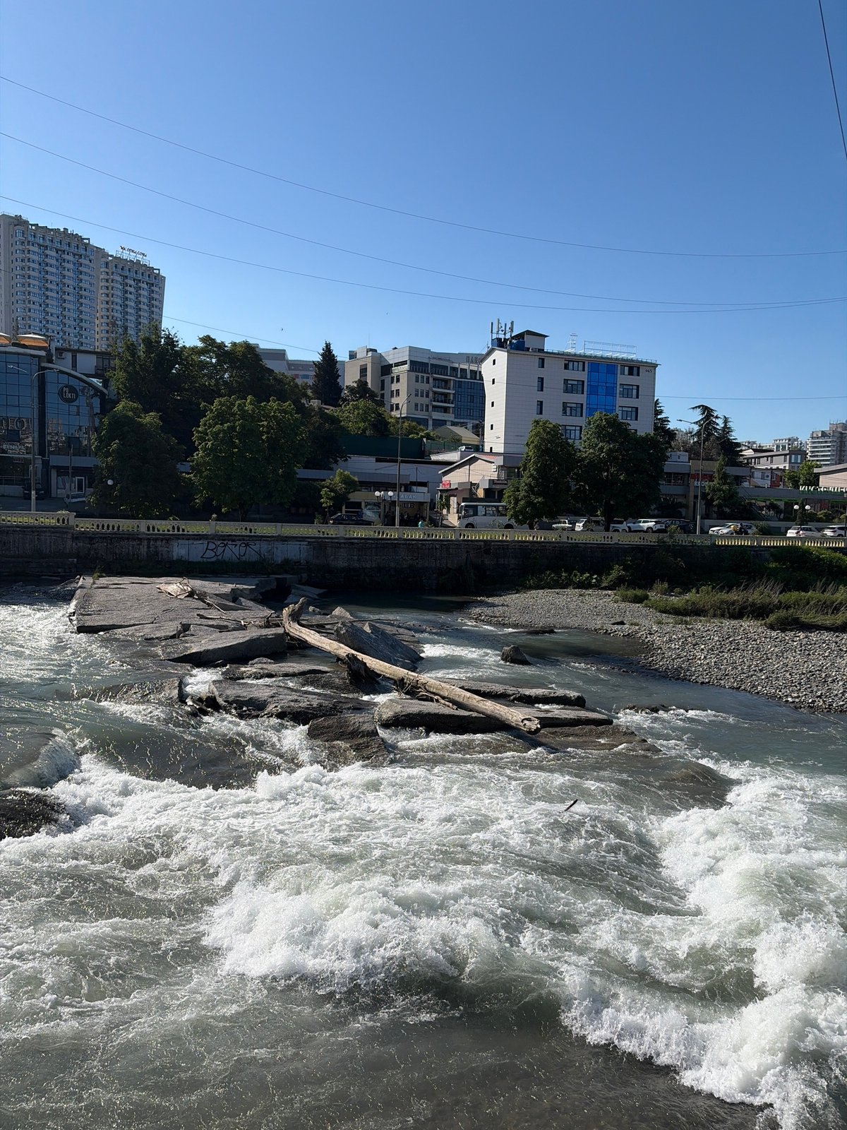 Morning documentation of Sochi riverside infrastructure and urban landscape