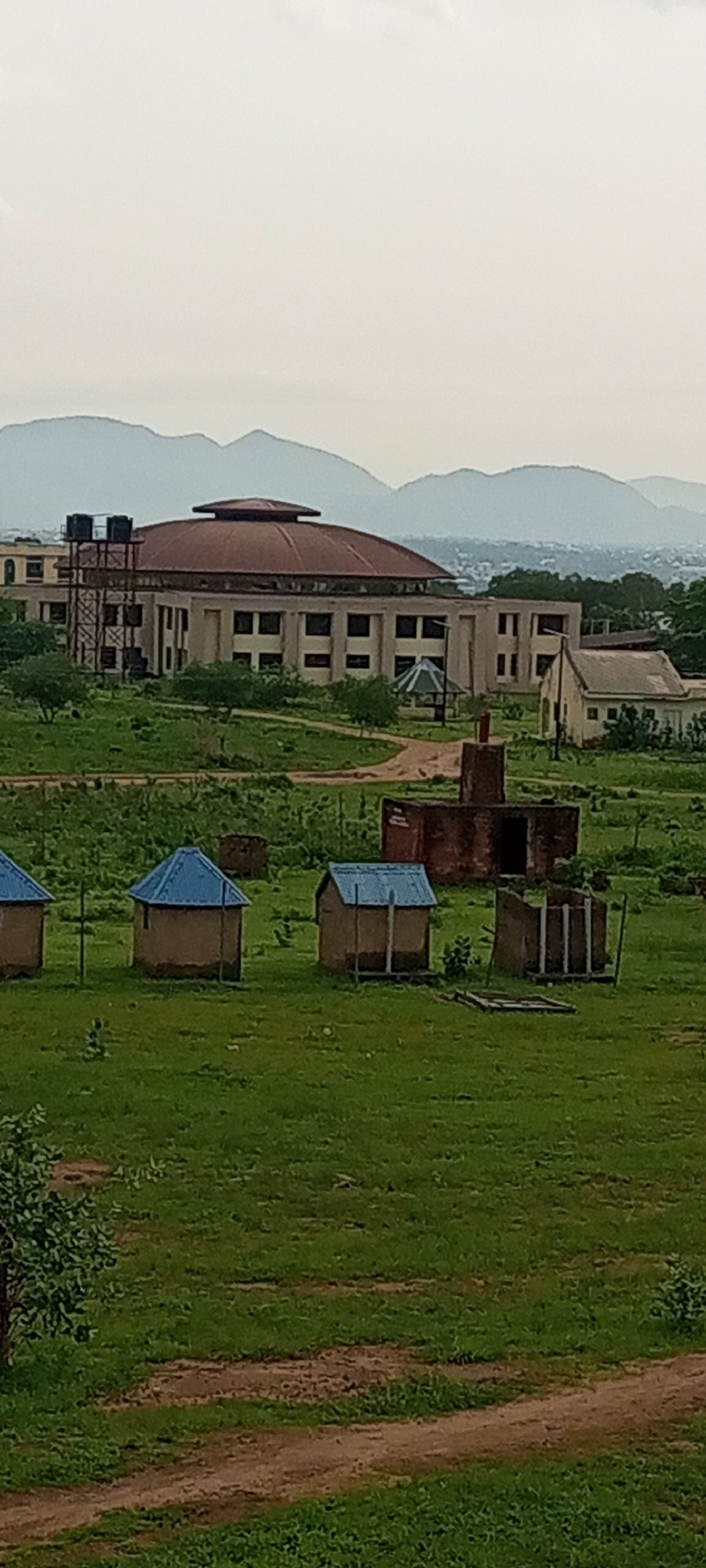 Rural landscape documentation with buildings and vegetation