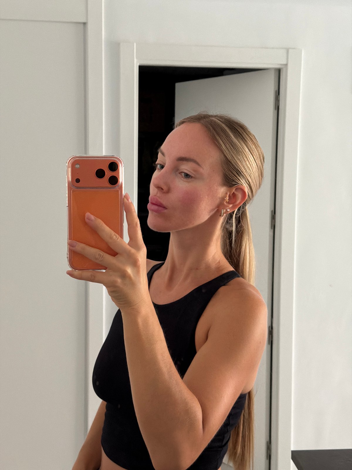 Mirror selfies and skincare in a Finestrat apartment