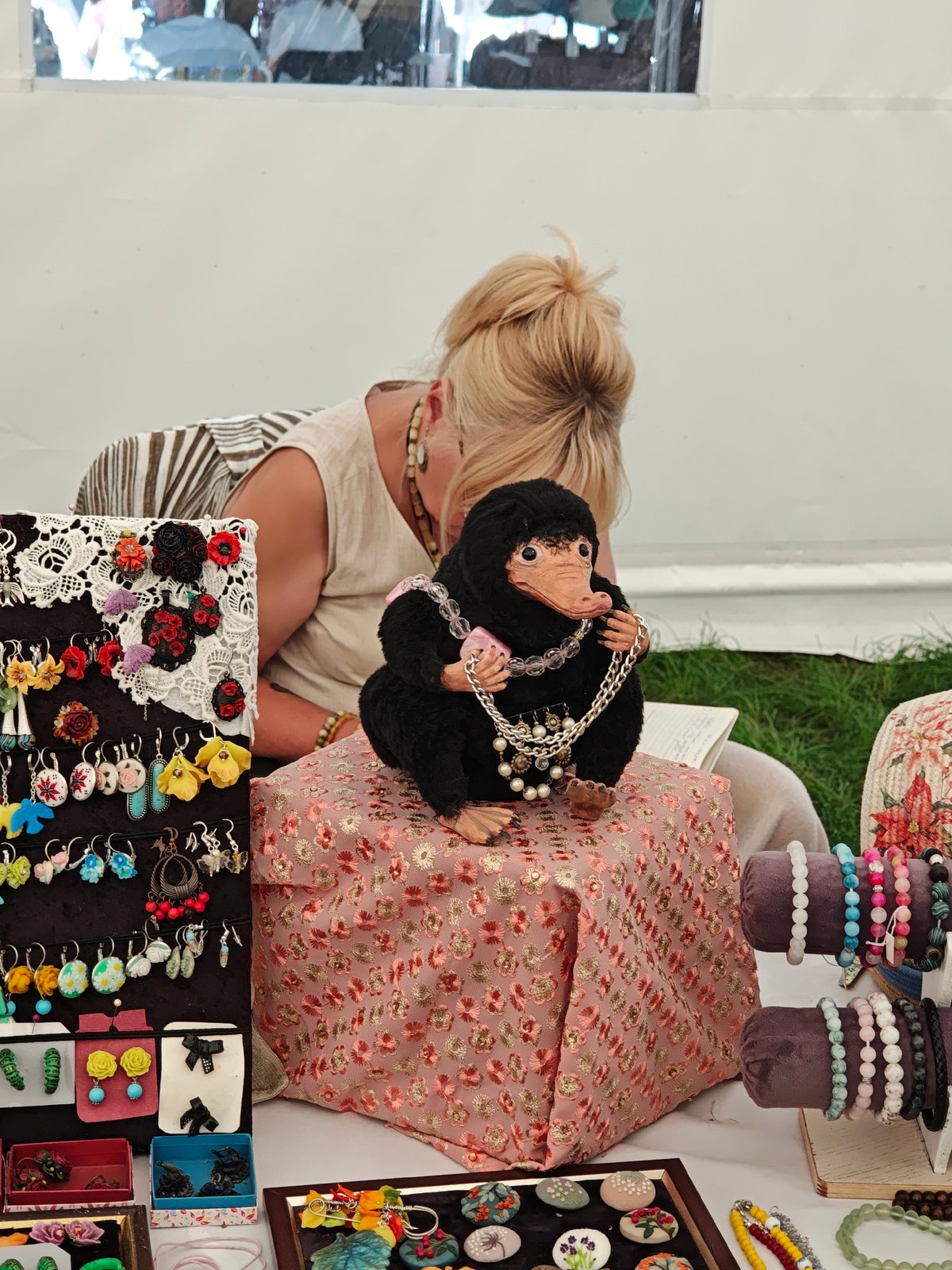 Sunny afternoon at a Vinnytsia street market, crafts and flowers