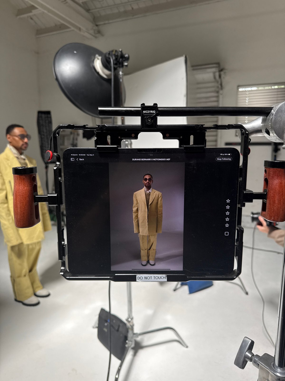 Yellow-suited model photographed at Los Angeles studio session