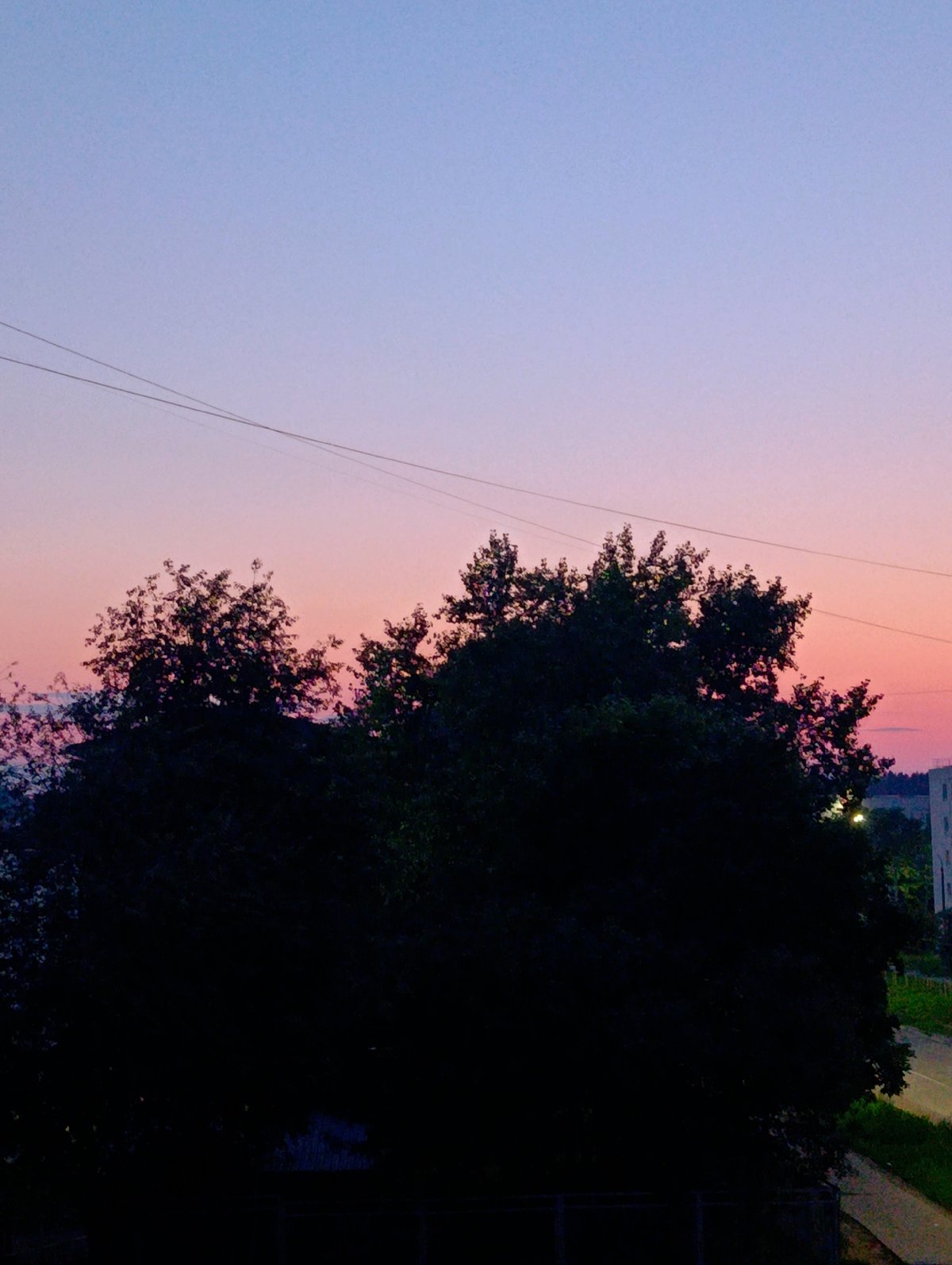 Sunset to moonrise over Chaikovsky's residential streets