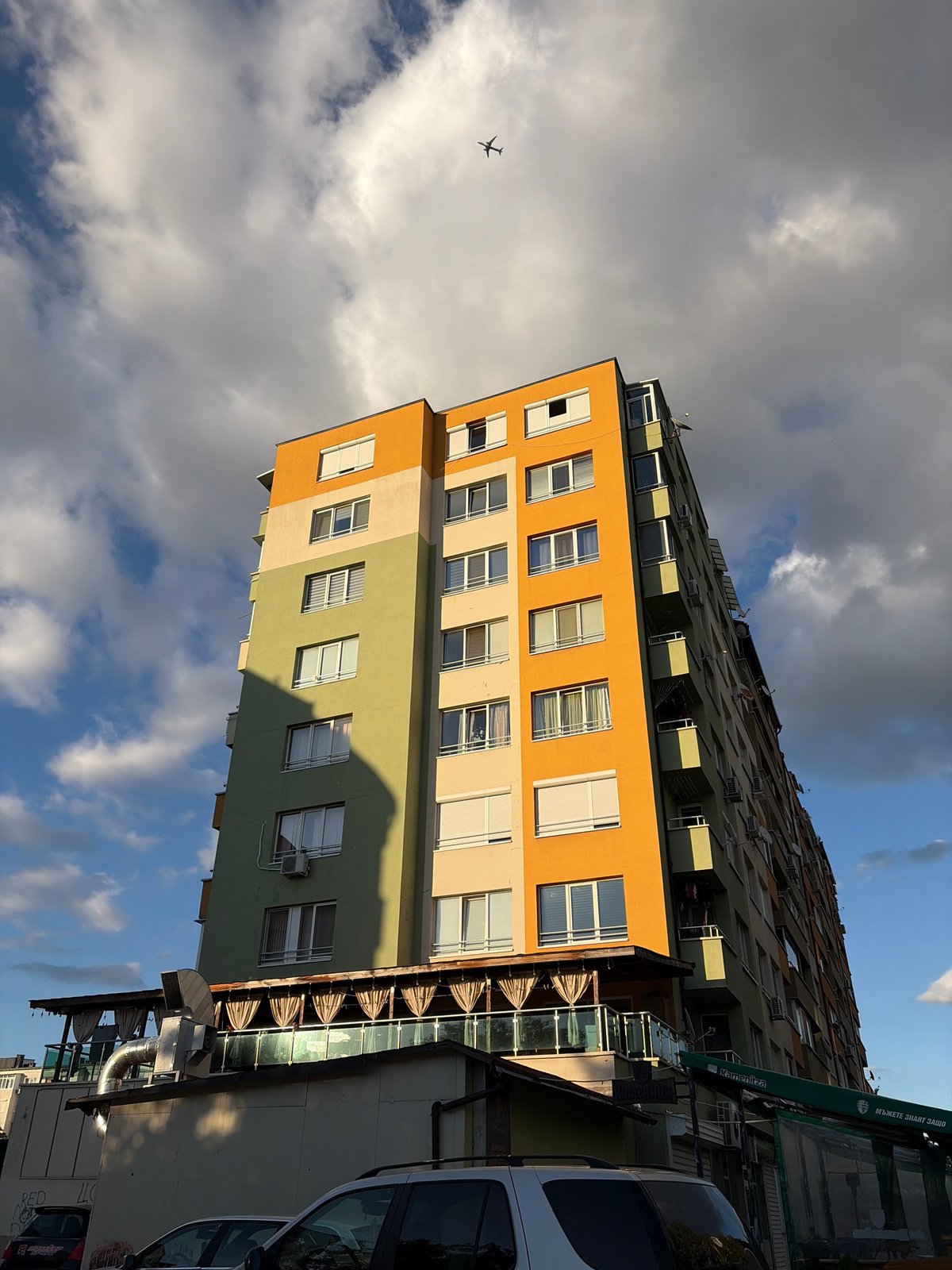 Colorful apartment complex photographed from multiple angles