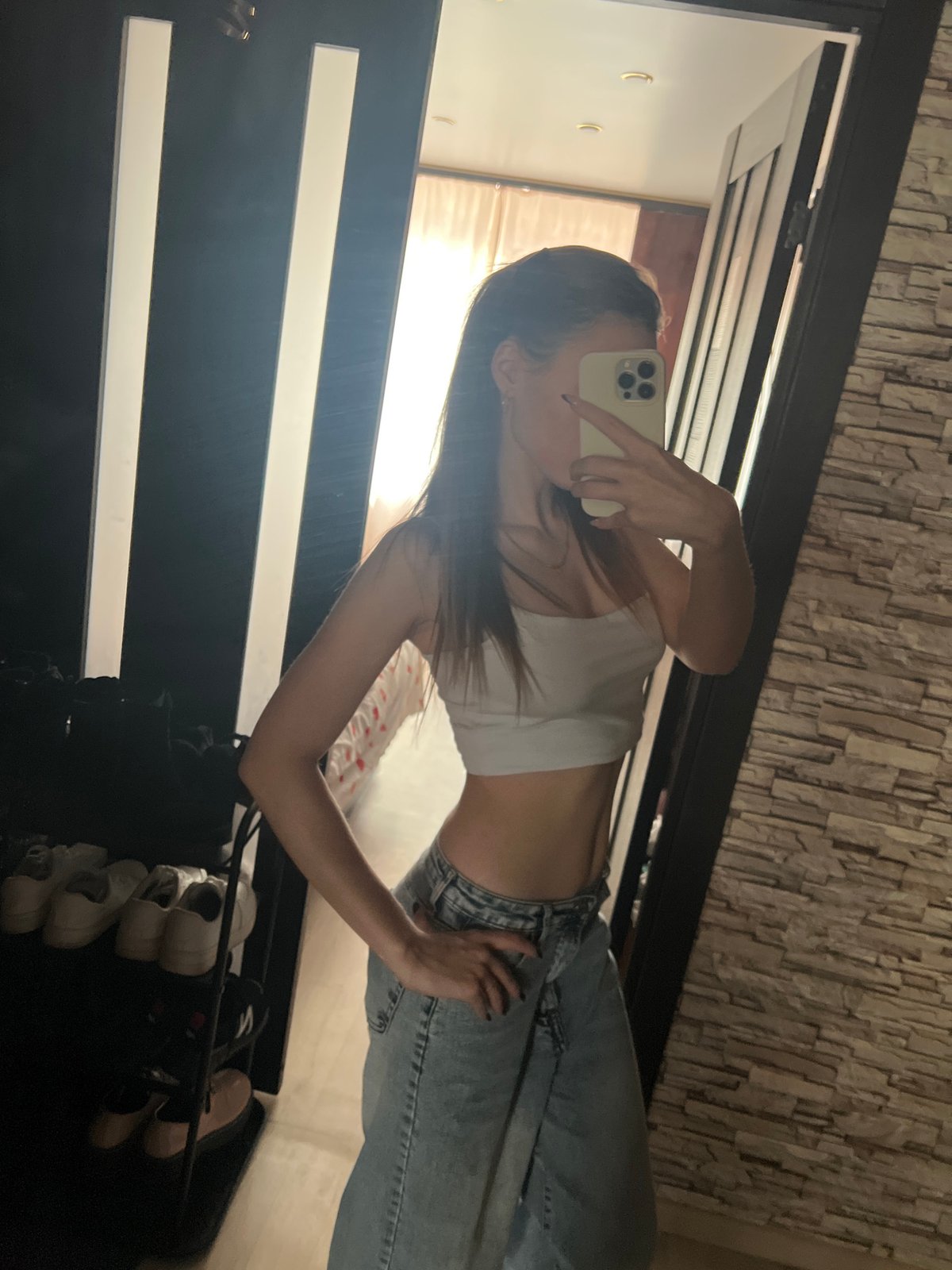 Woman takes morning selfies in bedroom in Noviy, Russia